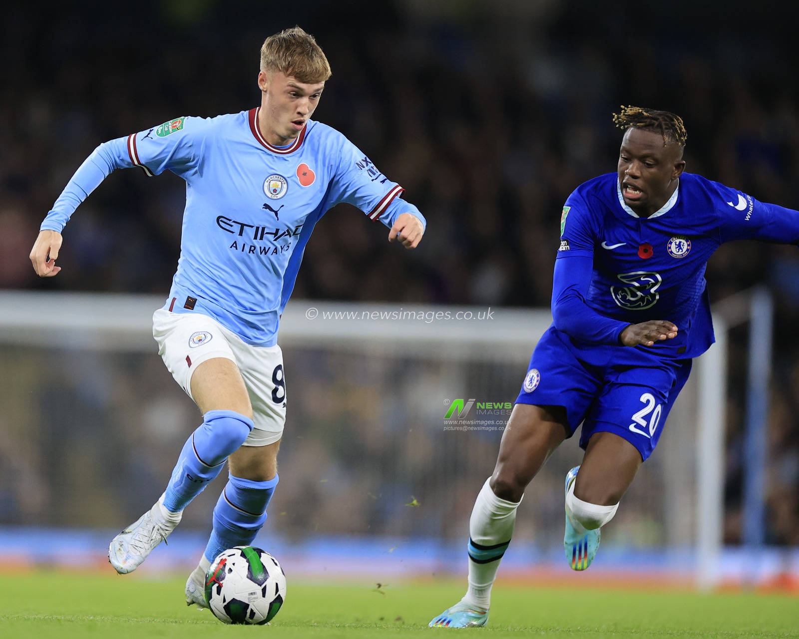 Cole Palmer #80 of Manchester City runs with the ball chased by Denis Zakaria #20 of Chelsea during the Carabao Cup Third Round match Manchester City vs Chelsea at Etihad Stadium, Manchester, United Kingdom, 9th November 2022

(Photo by Conor Molloy/News Images)