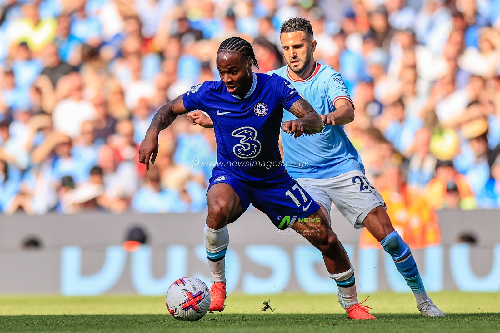 Raheem Sterling #17 of Chelsea holds he ball under pressure from Riyad Mahrez #26 of Manchester City during the Premier League match Manchester City vs Chelsea at Etihad Stadium, Manchester, United Kingdom, 21st May 2023

(Photo by Conor Molloy/News Images)