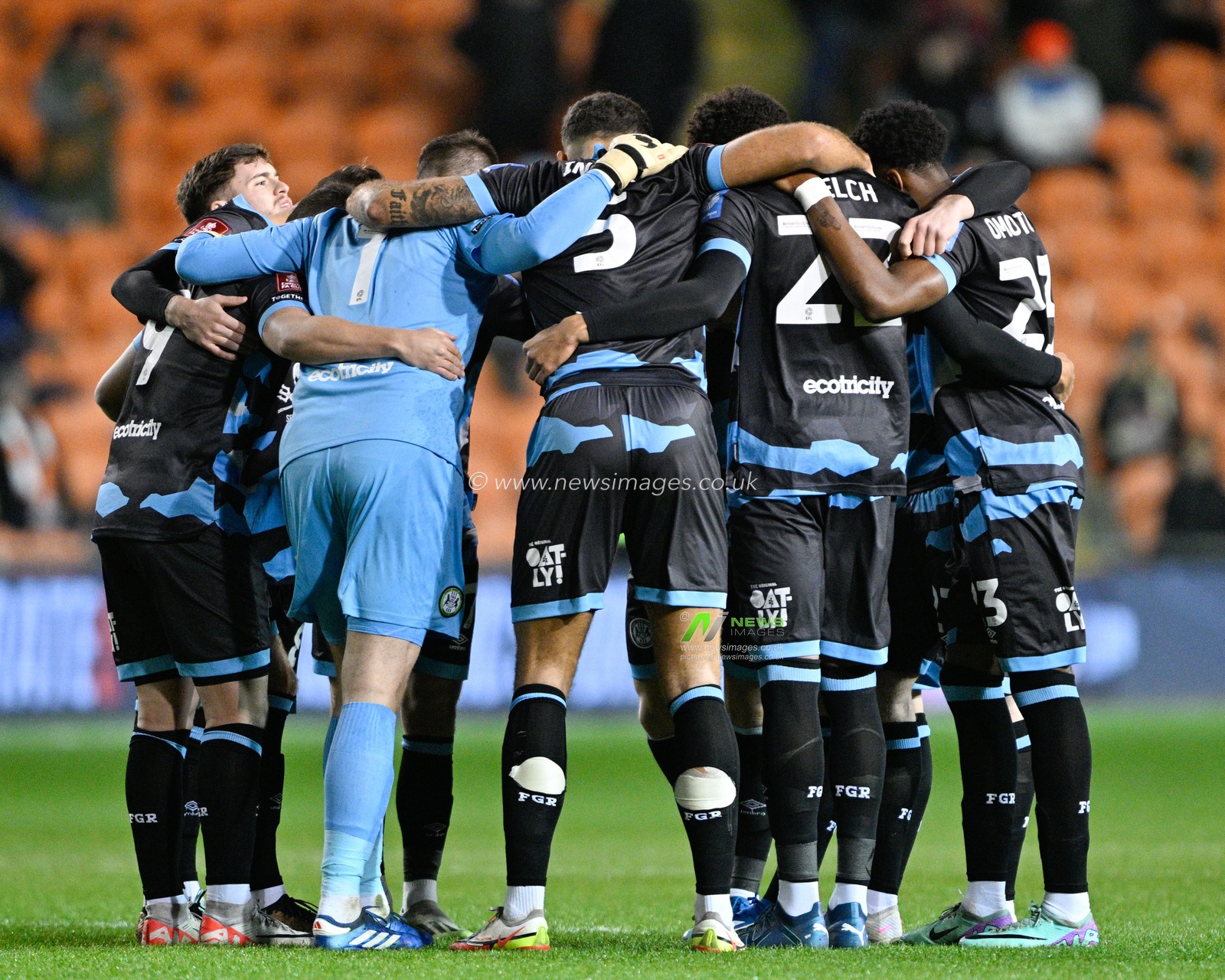 Forest Green Rovers have a team huddle ahead of kick off, during the Emirates FA Cup Second Round match Blackpool vs Forest Green Rovers at Bloomfield Road, Blackpool, United Kingdom, 19th December 2023

(Photo by Cody Froggatt/News Images)