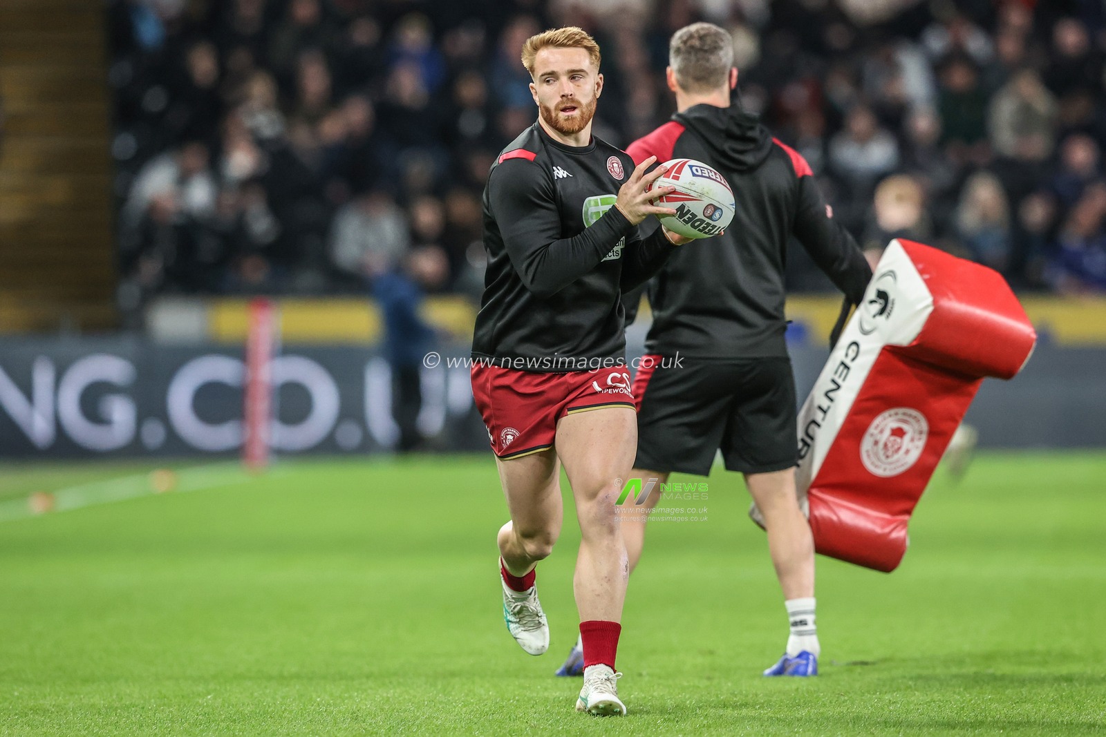 Adam Keighran of Wigan Warriors during pre-game warm up during the Betfred Super League Round 2 match Hull FC vs Wigan Warriors at MKM Stadium, Hull, United Kingdom, 21st February 2025

(Photo by Alfie Cosgrove/News Images)