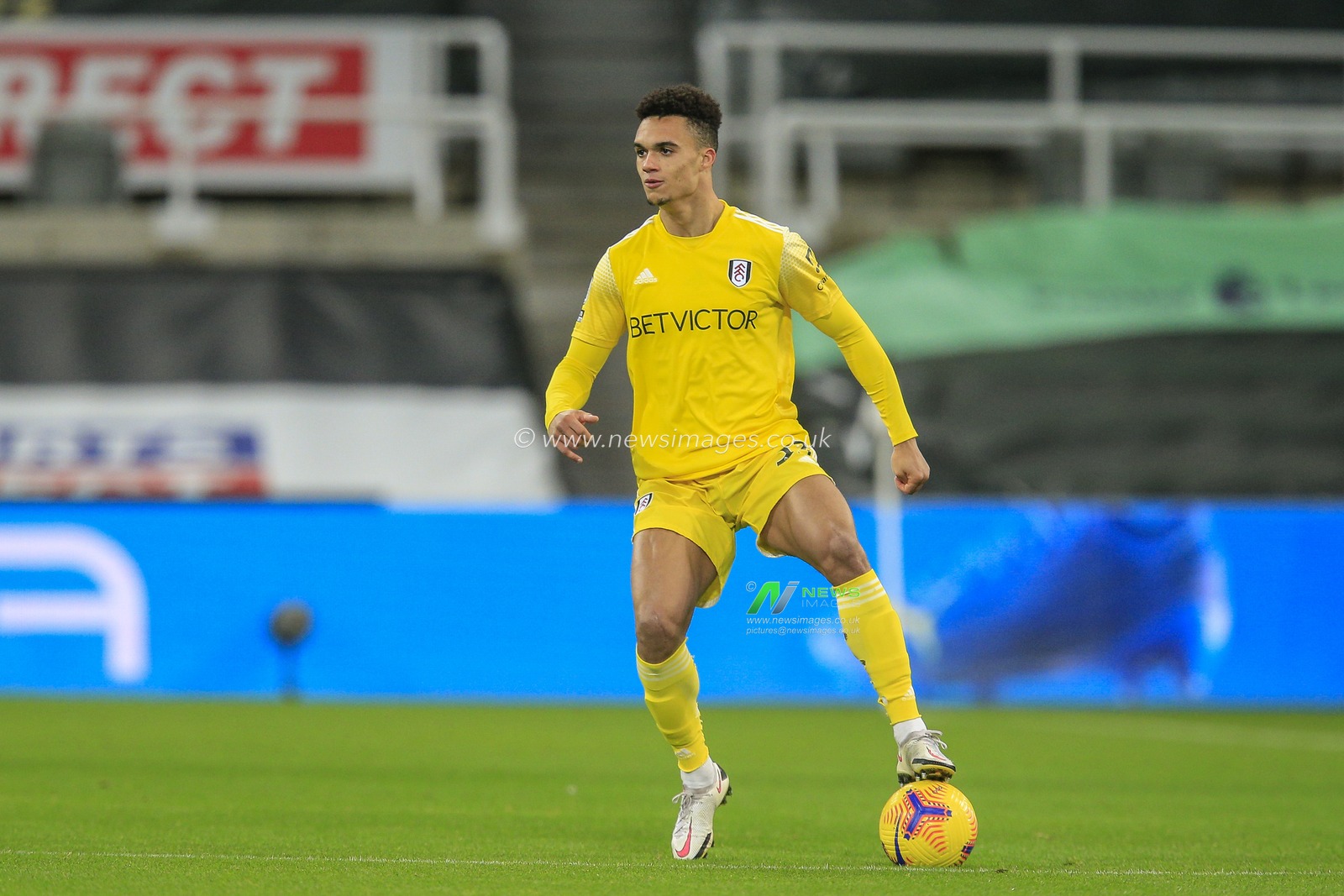 Antonee Robinson #33 of Fulham in possession of the ball