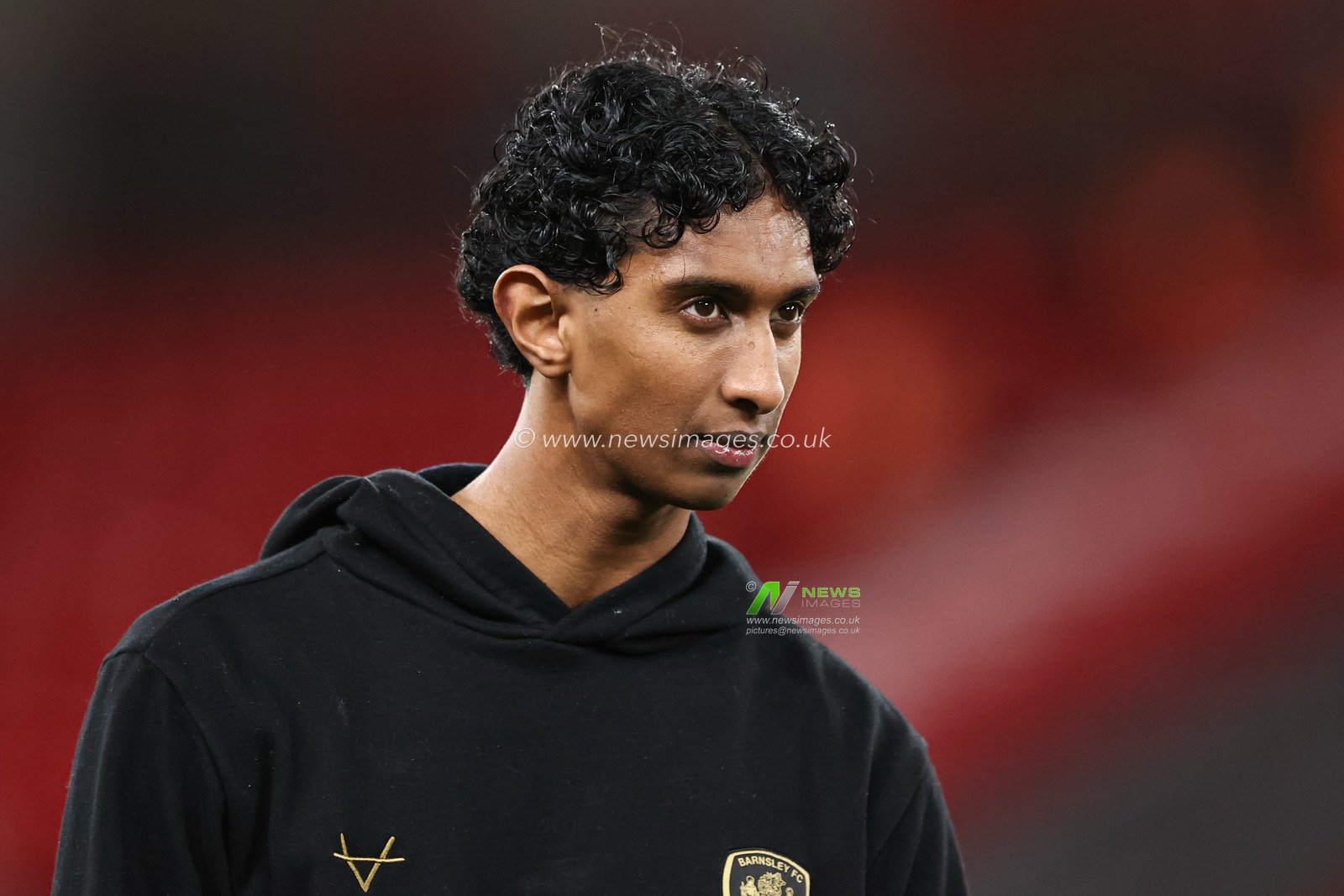 Vimal Yoganathan of Barnsley inspects the pitch prior to kick off for the Emirates FA Cup Third Round match Liverpool vs Barnsley at Anfield, Liverpool, United Kingdom, 12th January 2026

(Photo by Alfie Cosgrove/News Images)