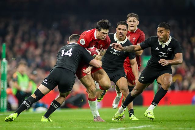 Louis Rees-Zammit of Wales is tackled by Will Jordan of New Zealand during the Quilter Nations Series 2025 match Wales vs New Zealand at Principality Stadium, Cardiff, United Kingdom, 22nd November 2025

(Photo by Andrew Lewis/News Images)

*** GER AUT SUI OUT ***