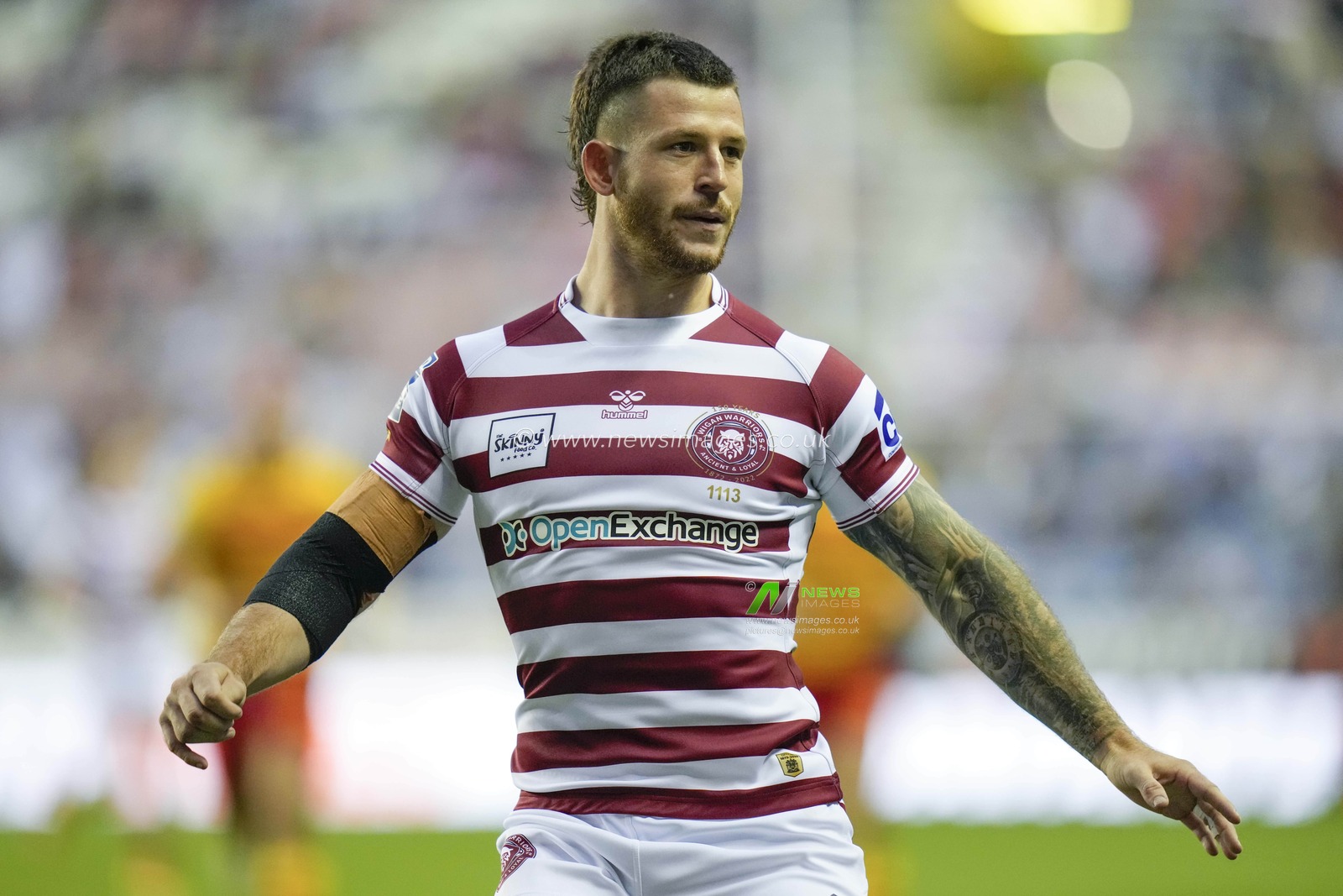 Cade Cust #6 of Wigan Warriors chases the ball during the Betfred Super League match Wigan Warriors vs Catalans Dragons at DW Stadium, Wigan, United Kingdom, 2nd September 2022

(Photo by Steve Flynn/News Images)
