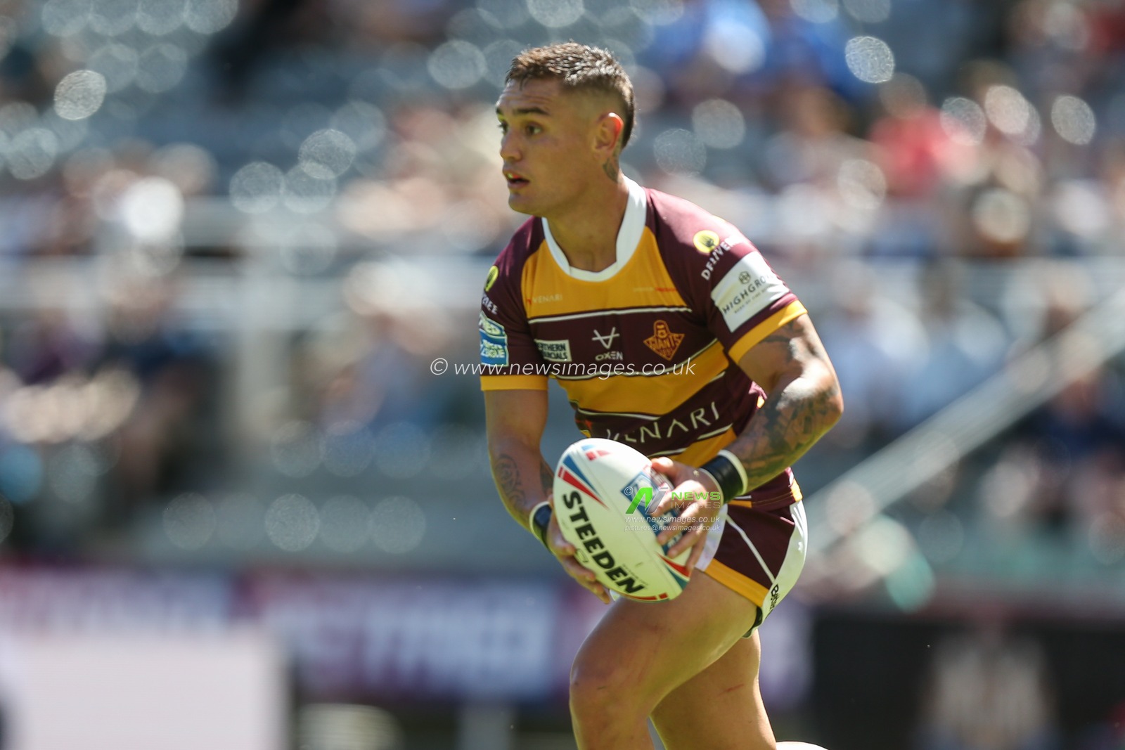 Danny Levi #9 of Huddersfield Giants in action during the game