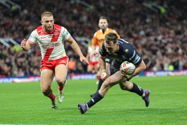 Harry Smith of Wigan Warriors goes over for a try during the 2025 Betfred Super League Grand Final Hull KR v Wigan Warriors at Old Trafford, Manchester, United Kingdom, 11th October 2025

(Photo by Mark Cosgrove/News Images)