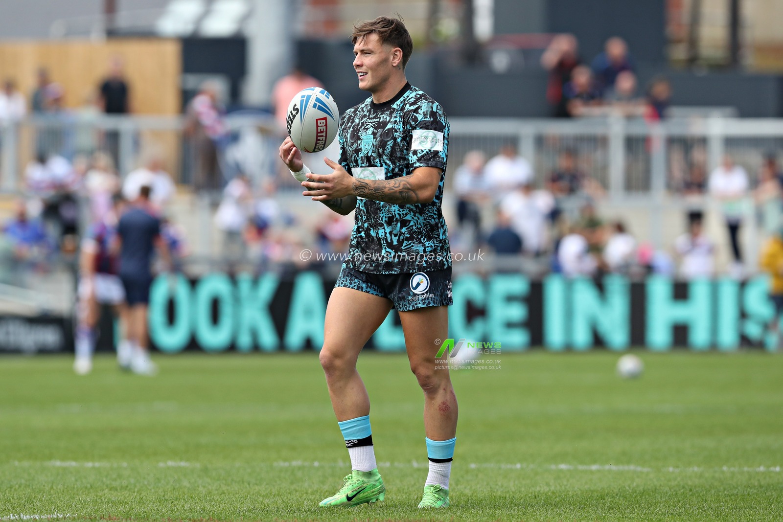 Keanan Brand of Leigh Leopards before the Betfred Super League Round 14 match Wakefield Trinity vs Leigh Leopards at DIY Kitchens Stadium, Wakefield, United Kingdom, 15th June 2025

(Photo by Sam Eaden/News Images)