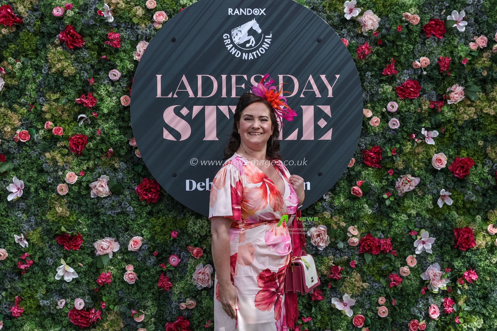 Racegoers pose for the Ladies Day style awards for the best dressed lady award during the 2026 Randox Grand National Ladies Day at Aintree Racecourse, Aintree, United Kingdom on 10 April 2026

(Photo by Mark Cosgrove/News Images)