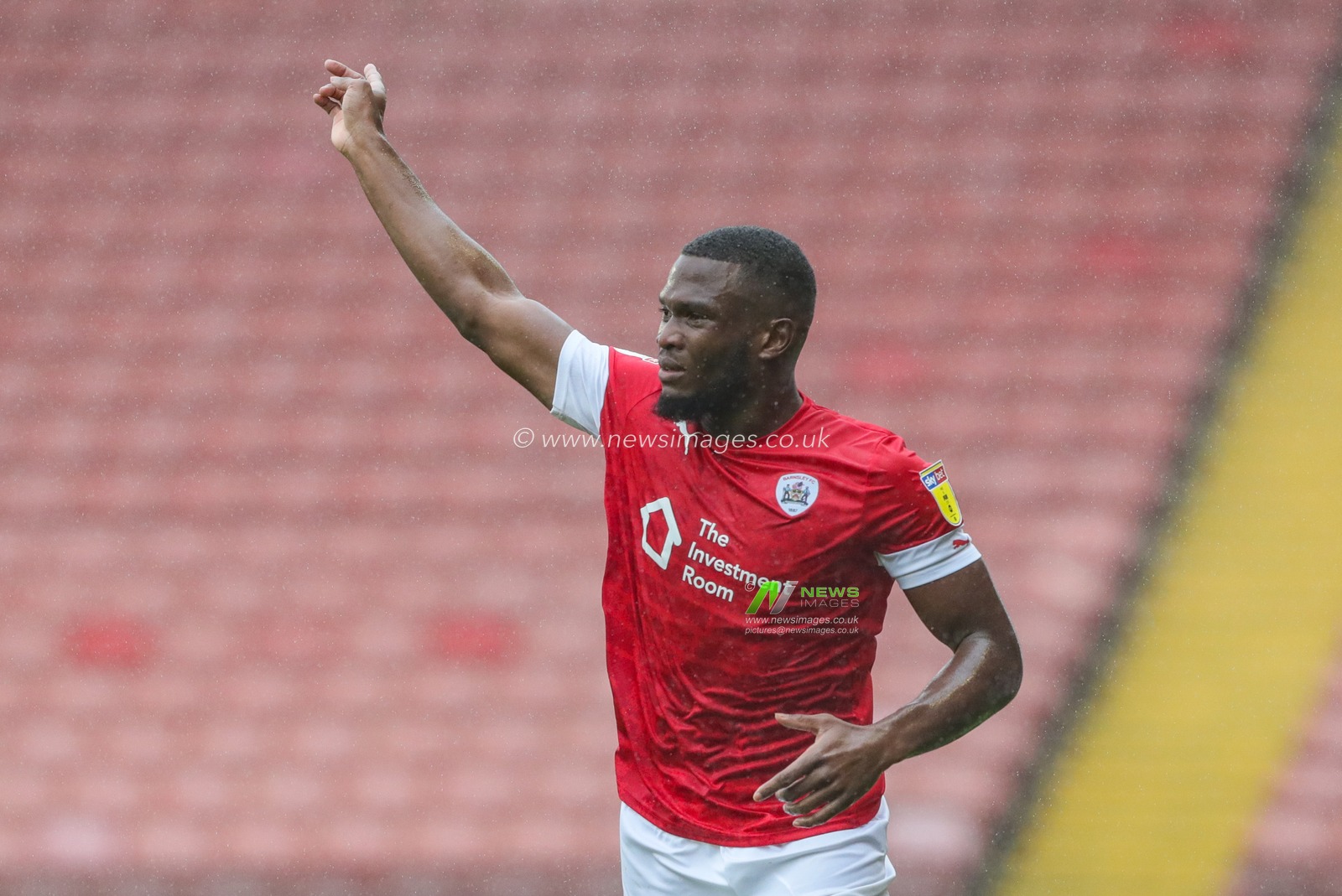 29th September 2019, Oakwell, Barnsley, England; Sky Bet Championship, Barnsley v Brentford : Dimitri Cavare (12) of Barnsley appears to referee David Webb

Credit: Mark Cosgrove/News Images