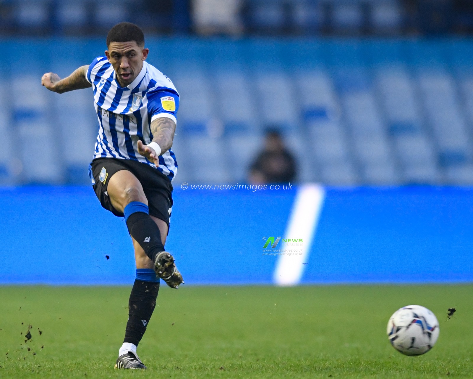 Liam Palmer #2 of Sheffield Wednesday passes the ball