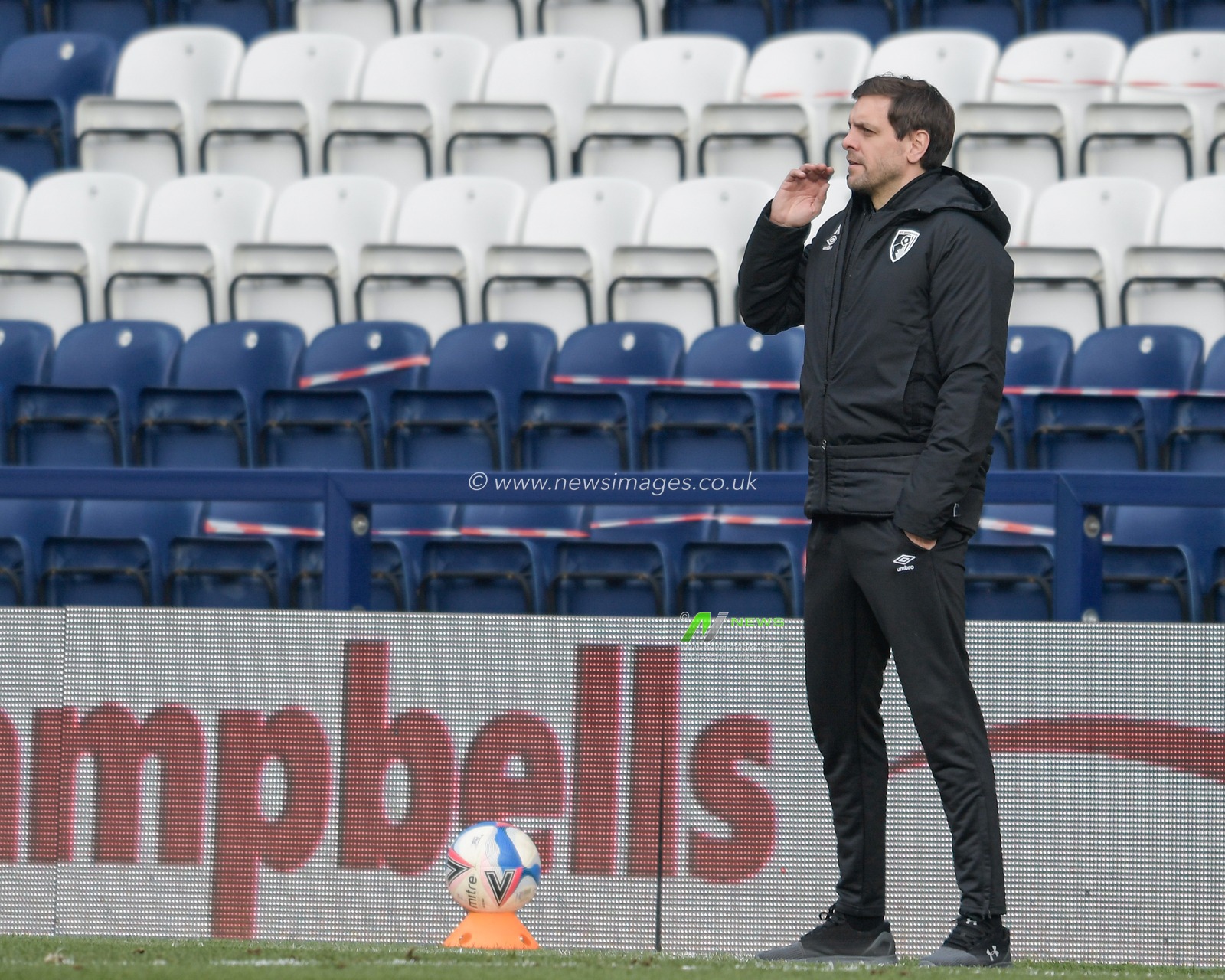 Jonathan Woodgate head coach of Bournemouth watches the game from the technical area