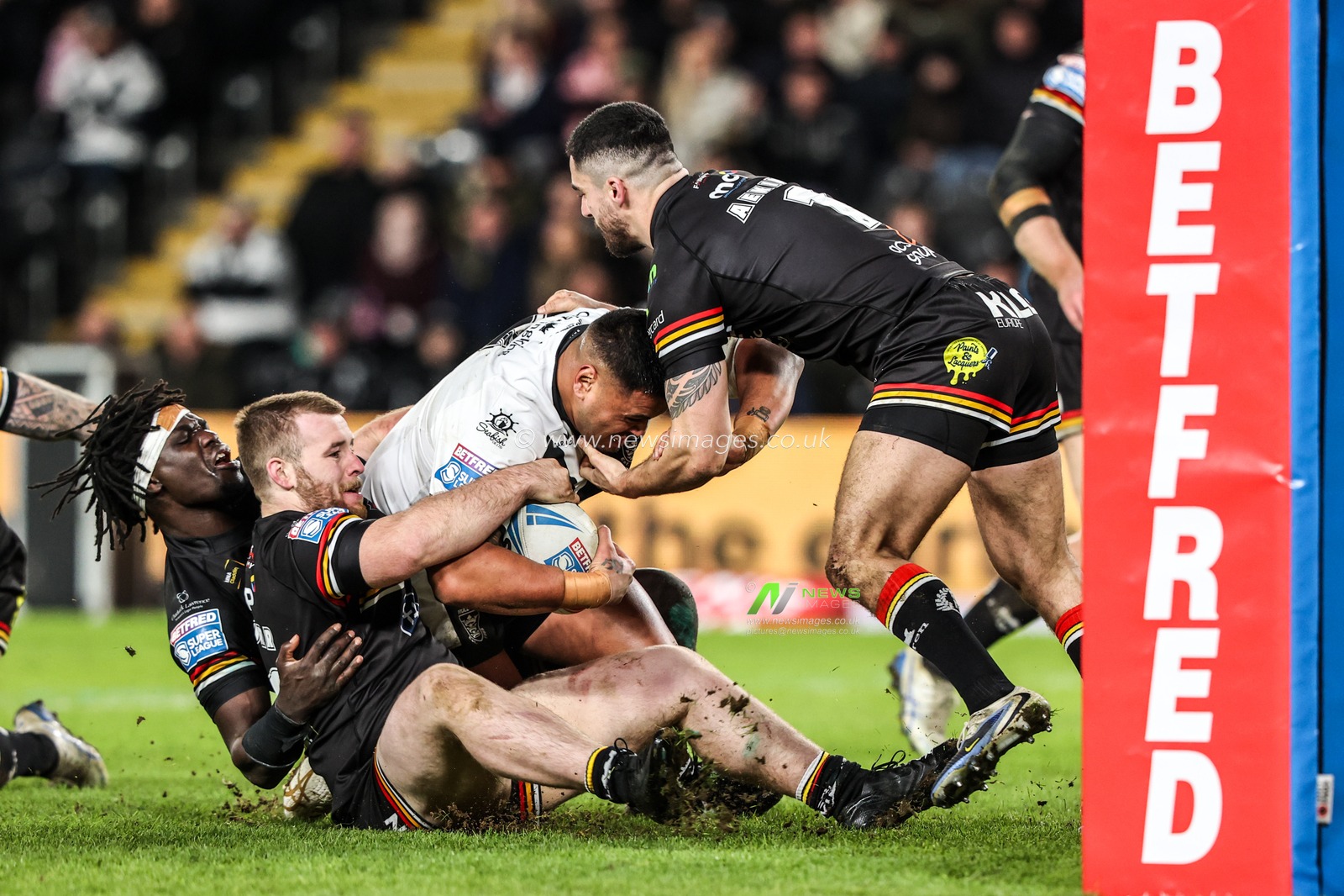 Herman Ese'ese of Hull FC is tackled during the Betfred Super League round 1 match Hull FC vs Bradford Bulls at MKM Stadium, Hull, United Kingdom on 14 February 2026

(Photo by Alfie Cosgrove/News Images)