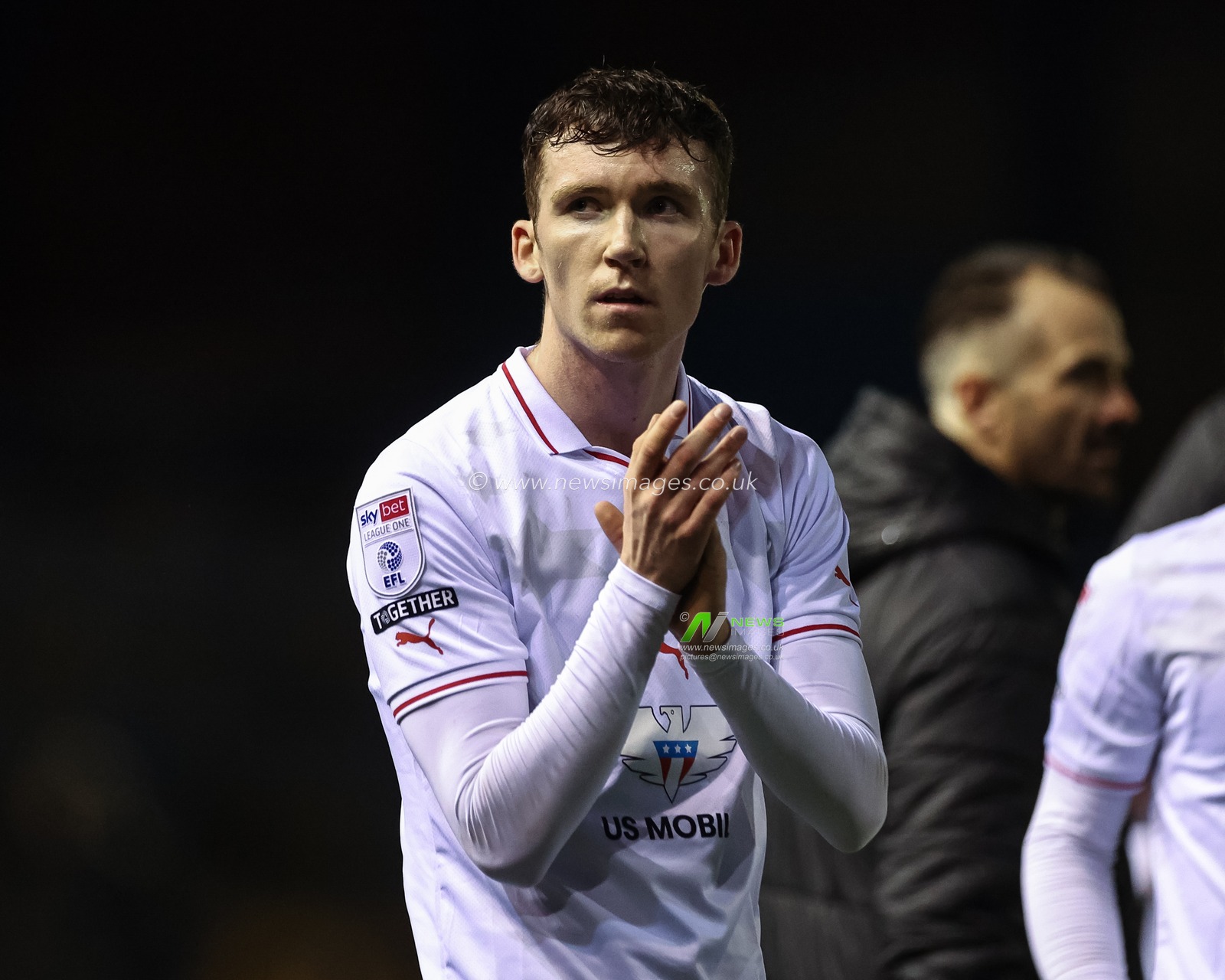 Conor Grant of Barnsley applauds the traveling fans during the Sky Bet League 1 match Carlisle United vs Barnsley at Brunton Park, Carlisle, United Kingdom, 12th March 2024

(Photo by Mark Cosgrove/News Images)