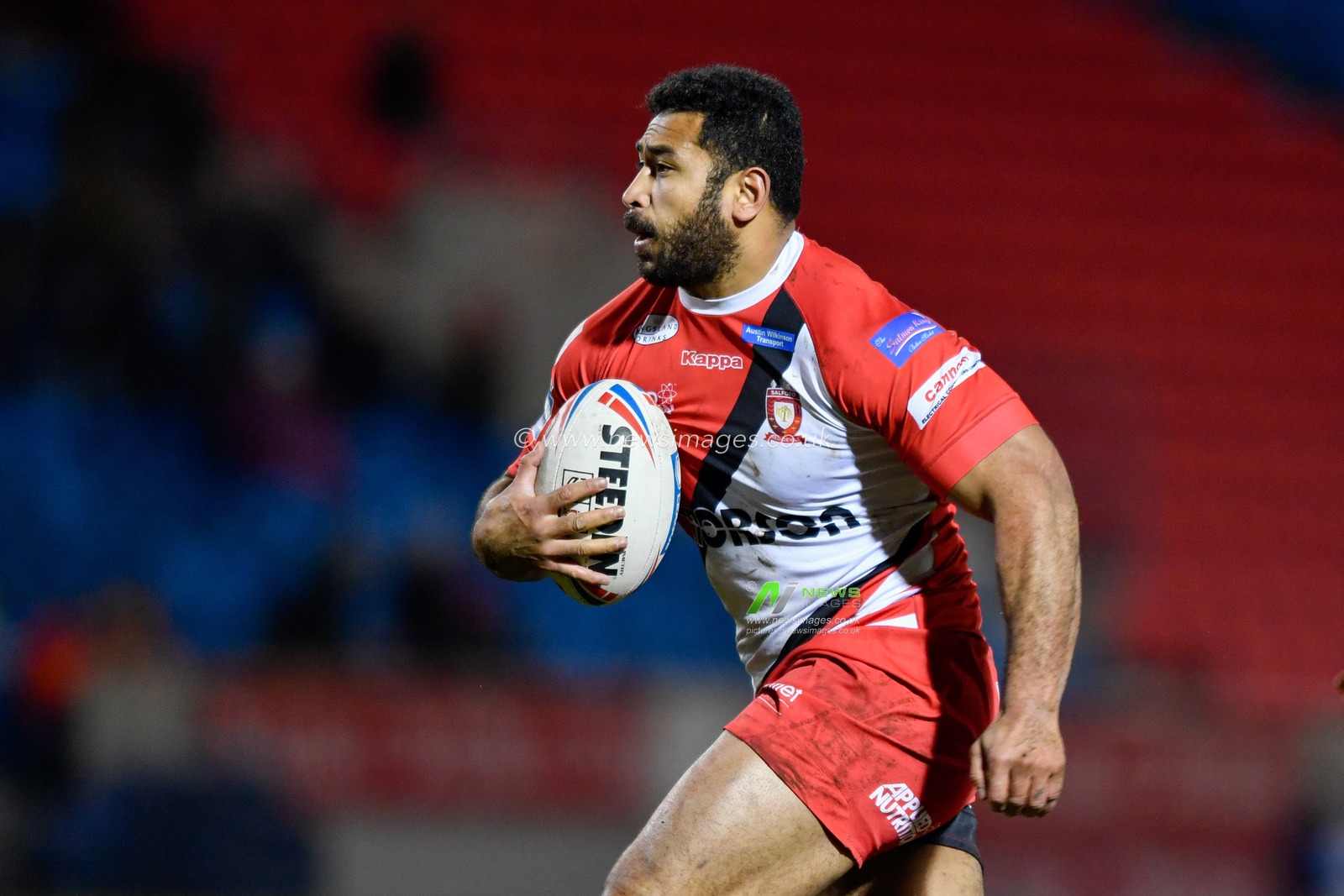 13th March 2020, AJ Bell Stadium, Eccles, England; Betfred Super League, Salford Red Devils v Wigan Warriors : Sebastine Ikahihifo (14) of Salford Red Devils runs forward with the ball