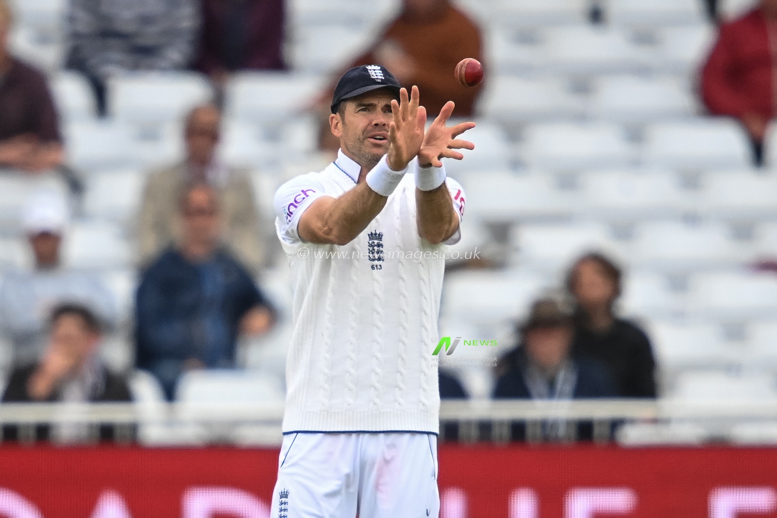 James Anderson of England catches the ball
