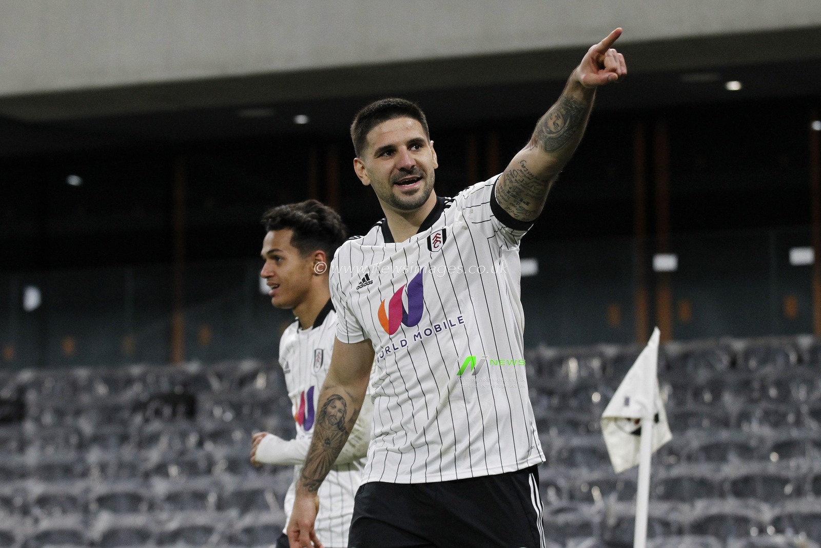 GOAL: Aleksandar Mitrovic #9 of Fulham celebrates scoring.