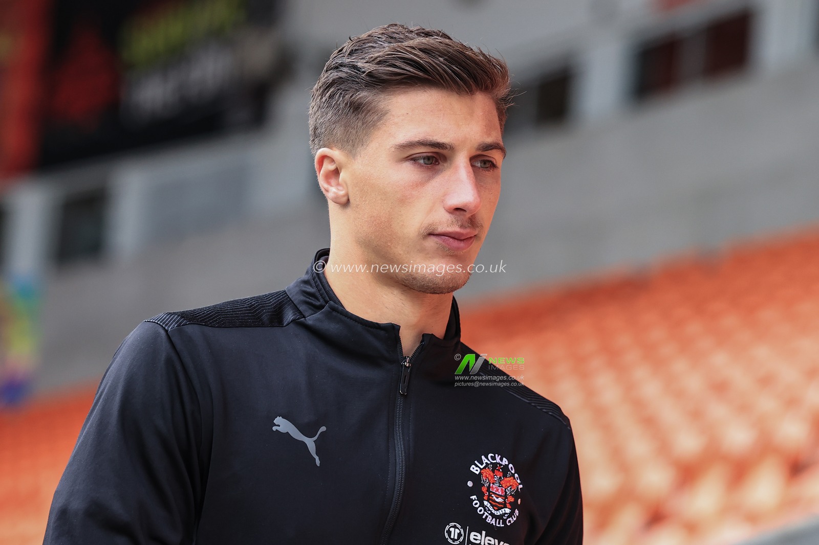 Stuart Moore #13 of Blackpool arrives at Bloomfield Road ahead of the Lancashire derby