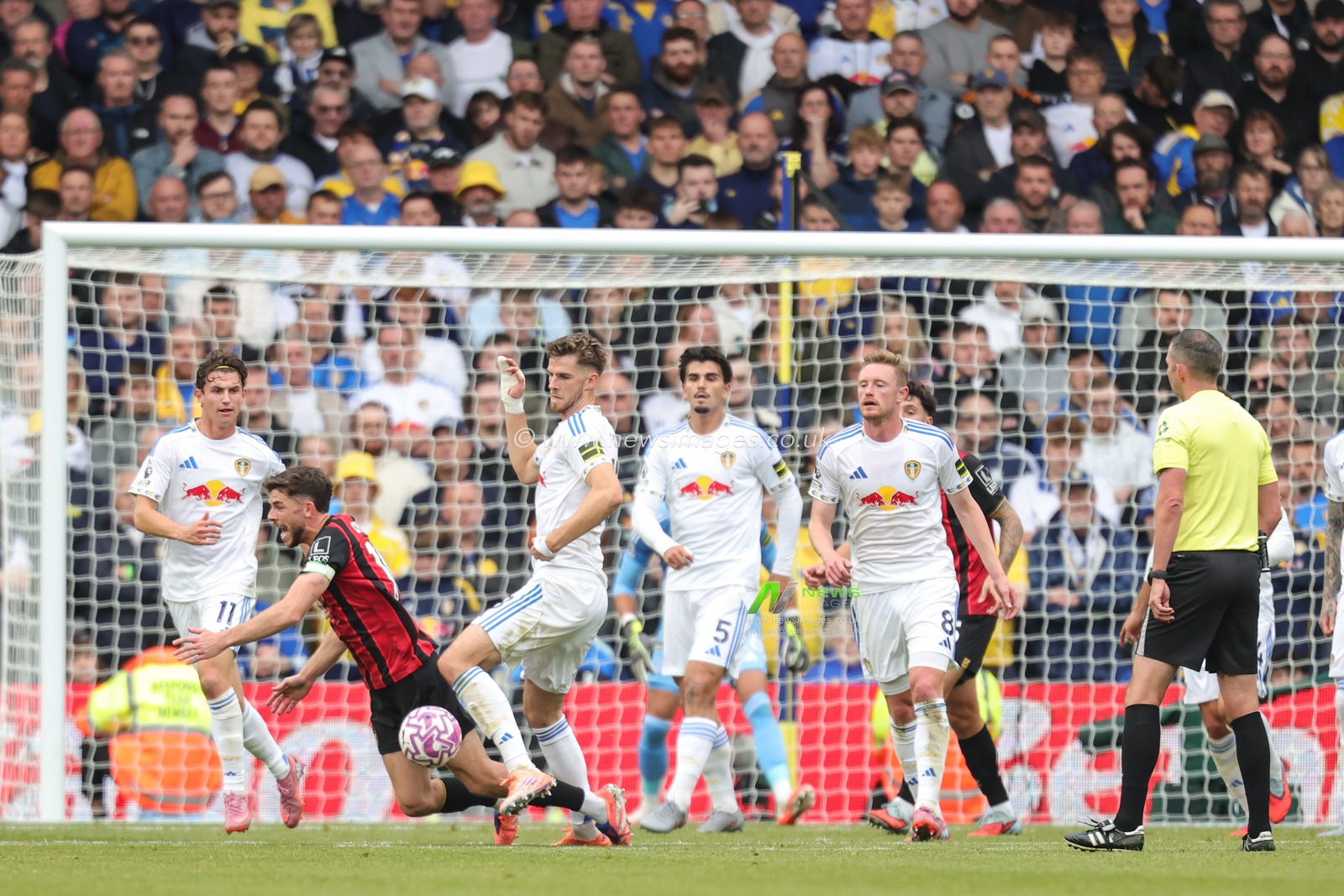 Ryan Christie of Bournemouth is fouled by Joe Rodon of Leeds United during the Premier League match Leeds United vs Bournemouth at Elland Road, Leeds, United Kingdom, 27th September 2025

(Photo by Richard Bierton/News Images)