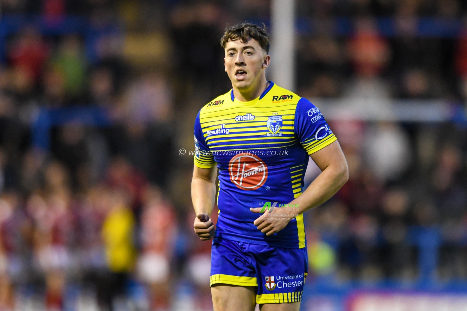 Matty Ashton #5 of Warrington Wolves in action during the game