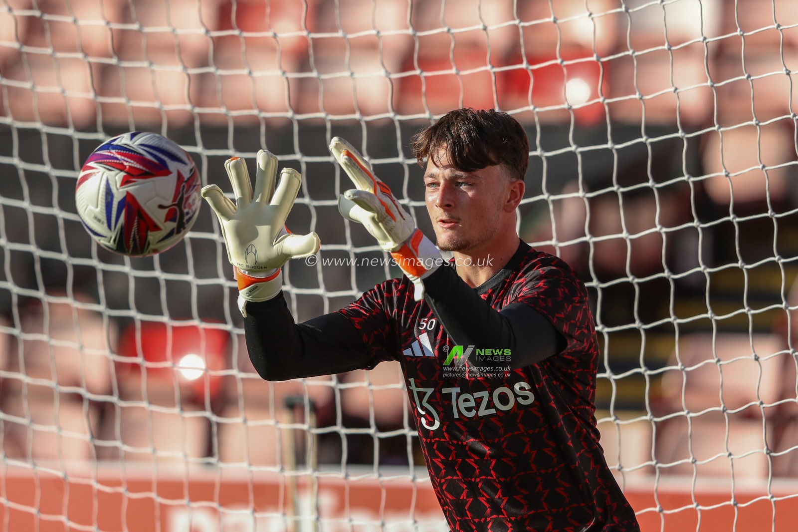 Elyh Harrison of Manchester United in the pregame warmup session during the Bristol Street Motors Trophy match Barnsley vs Manchester United U21 at Oakwell, Barnsley, United Kingdom, 20th August 2024

(Photo by Alfie Cosgrove/News Images)