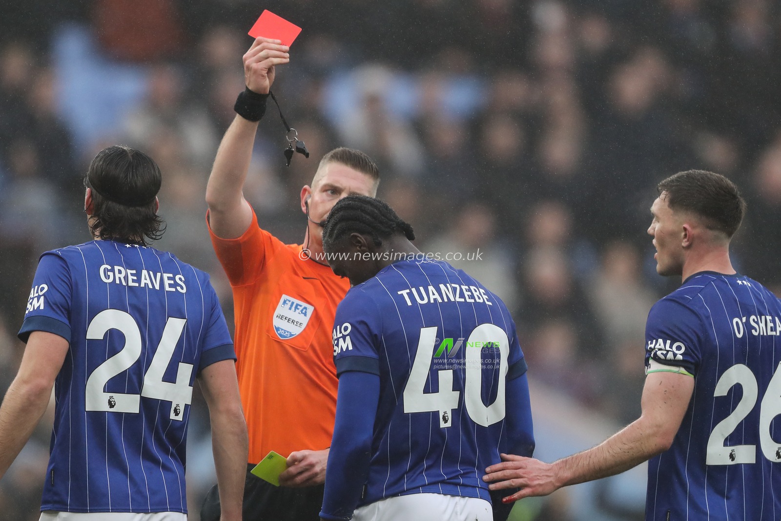 Axel Tuanzebe of Ipswich Town is shown a second yellow card and red card by referee Rob Jones following a foul on Jacob Ramsey of Aston Villa during the Premier League match Aston Villa vs Ipswich Town at Villa Park, Birmingham, United Kingdom, 15th February 2025

(Photo by Gareth Evans/News Images)