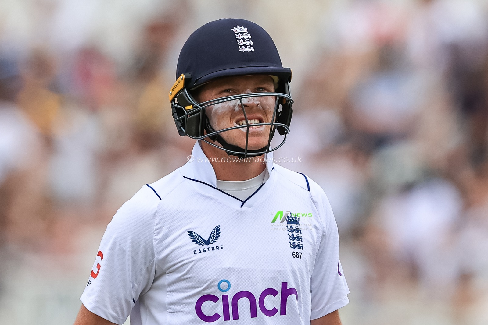 Ollie Pope of England leavers the field after being dismissed