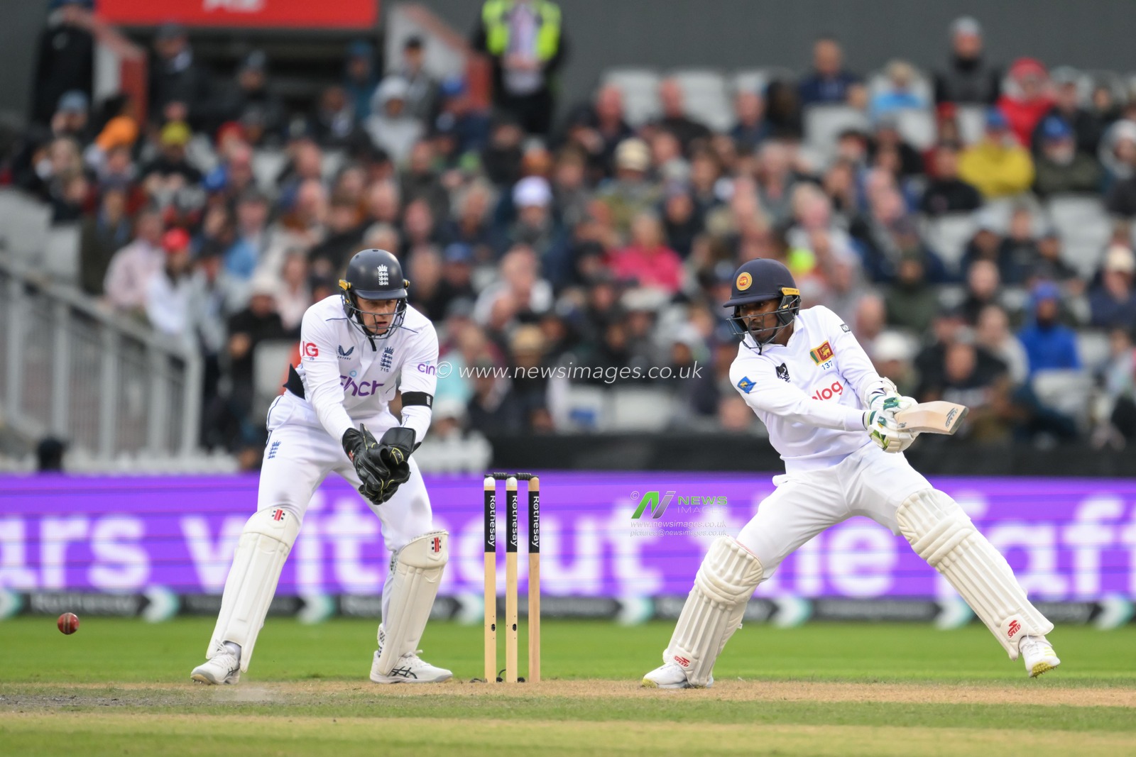 Vishwa Fernando of Sri Lanka cuts the ball away fro a single run during the England Men v Sri Lanka 1st Rothesay Test Match at Old Trafford, Manchester, United Kingdom, 20th August 2024

(Photo by Craig Thomas/News Images)