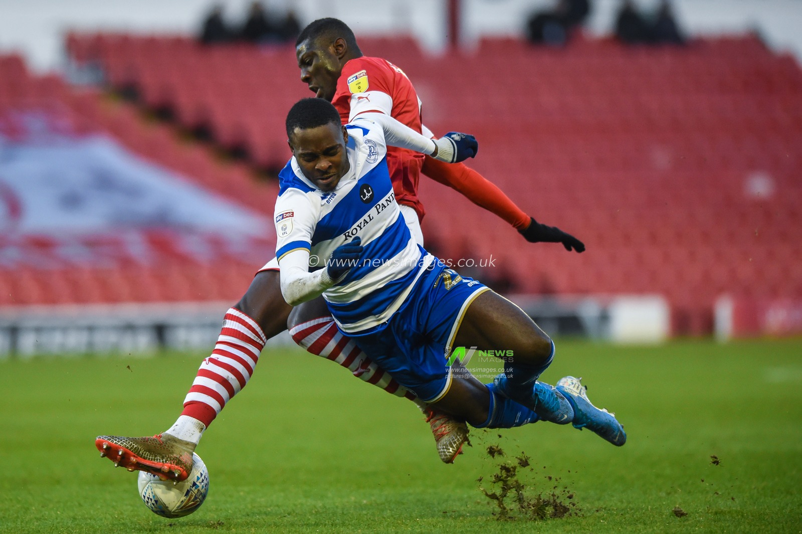 14th December 2019, Oakwell, Barnsley, England; Sky Bet Championship, Barnsley v Queens Park Rangers : Bambo Diaby (5) of Barnsley FC and Bright Osayi-Samuel (20) of Queens Park Rangers challenge for the ball 

Credit: Dean Williams/News Images