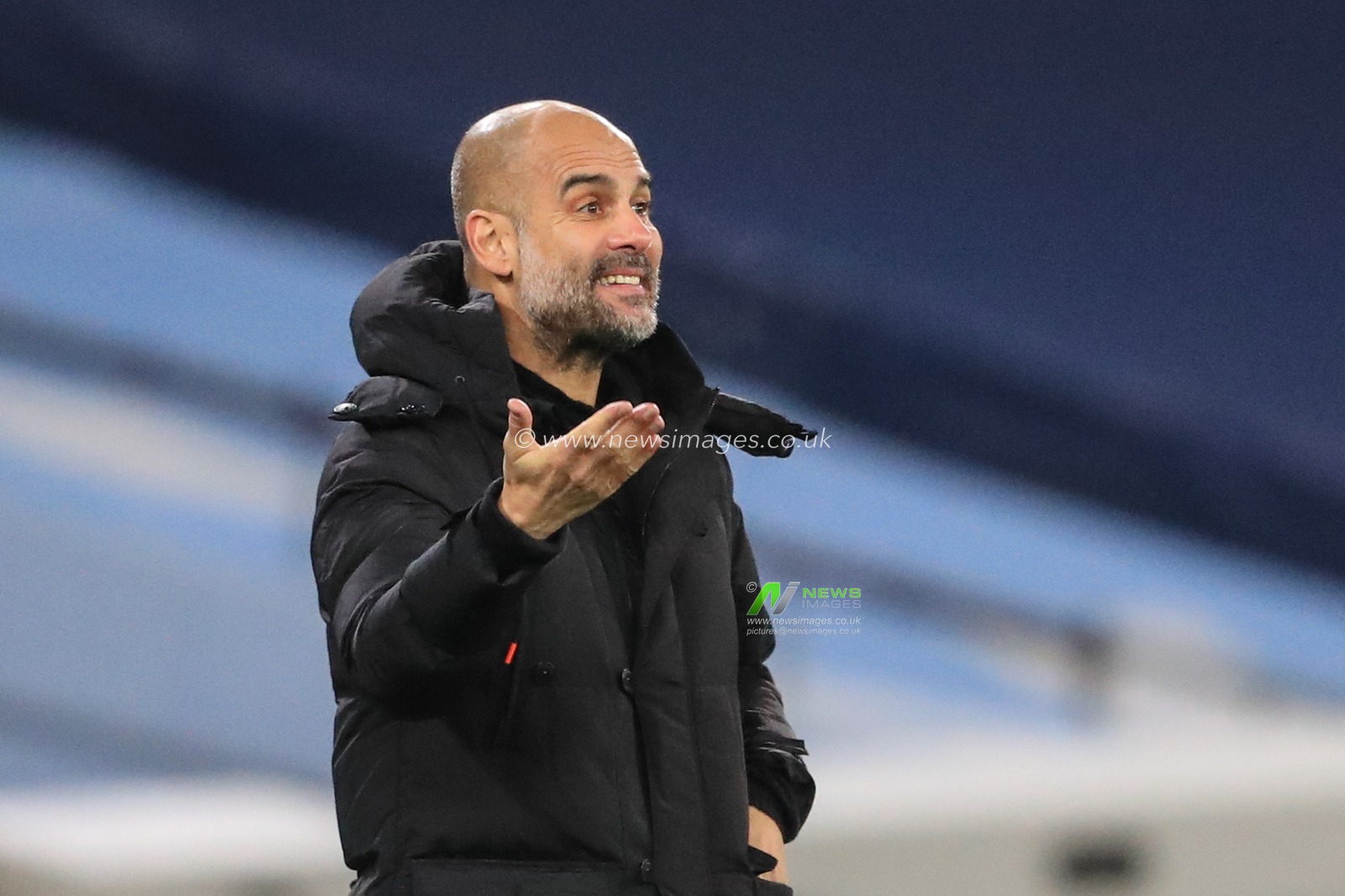 Josep Guardiola manager of Manchester City gives his team instructions