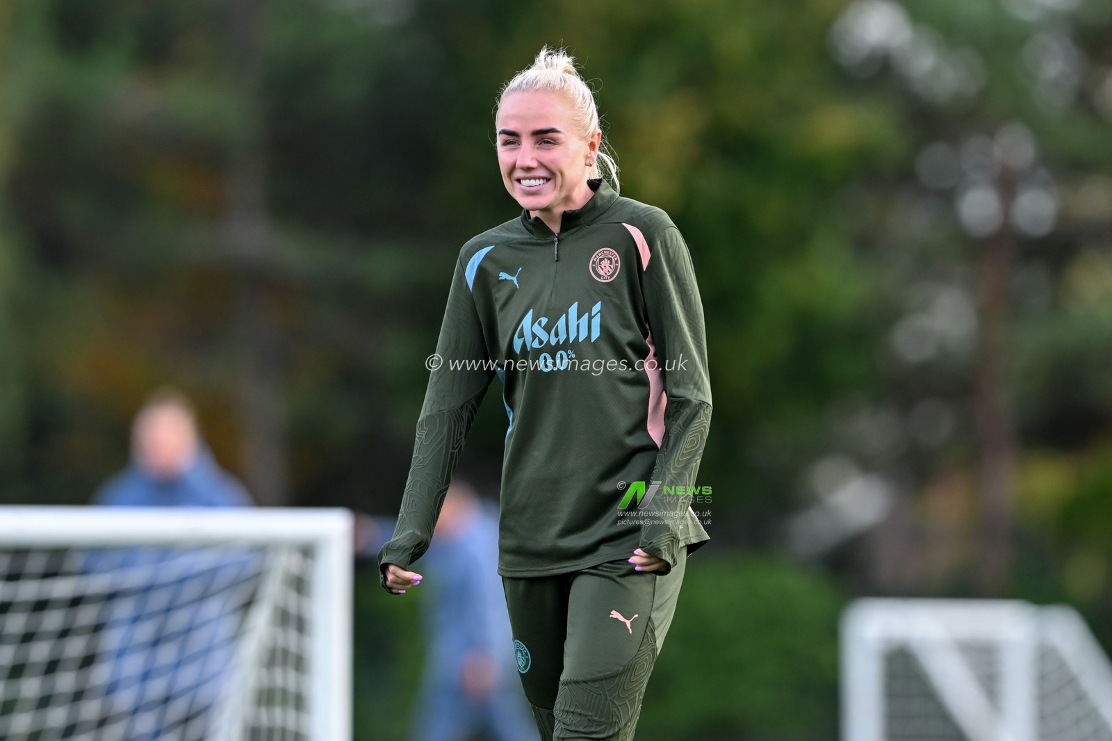 Alex Greenwood of Manchester City Women all smiles during Manchester City Women Champions league open training session at Joie Stadium, Manchester, United Kingdom, 8th October 2024

(Photo by Cody Froggatt/News Images)