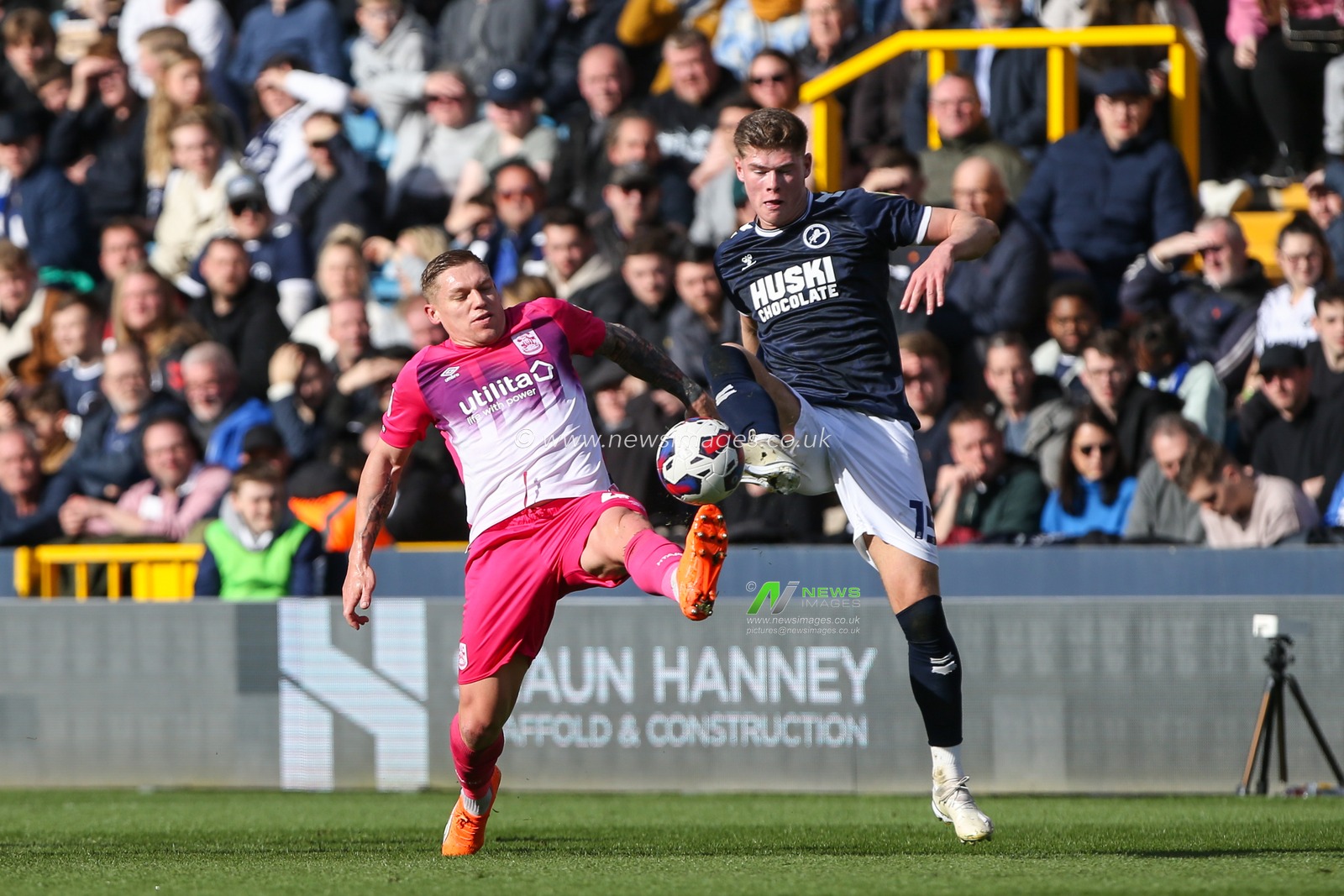 Martyn Waghorn #49 of Huddersfield Town and Charlie Cresswell #15 of Millwall challenge for the ball during the Sky Bet Championship match Millwall vs Huddersfield Town at The Den, London, United Kingdom, 18th March 2023

(Photo by Arron Gent/News Images)