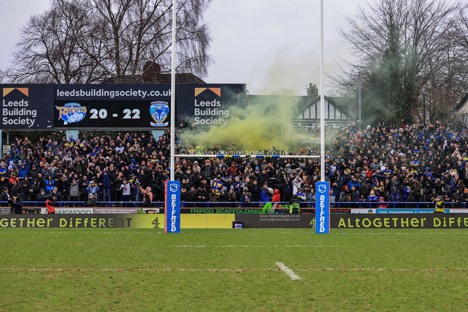 Warrington fans celebrate their 20-22 win over Leeds Rhinos