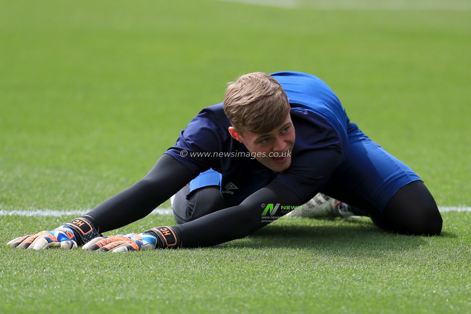 Harvey Cartwright #32 of Hull City stretching prior to kick off.
