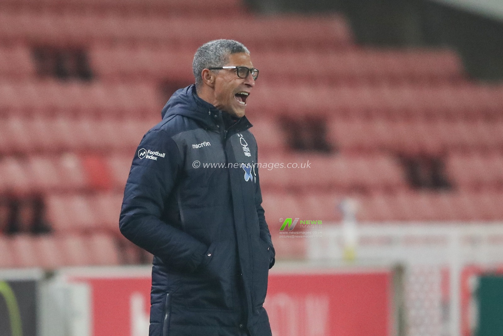 Chris Hughton manager of Nottingham Forest gives his team instructions