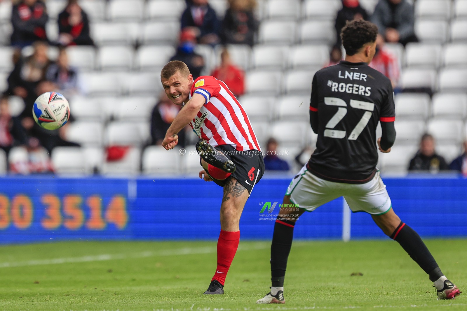 Max Power #6 of Sunderland plays the ball forward