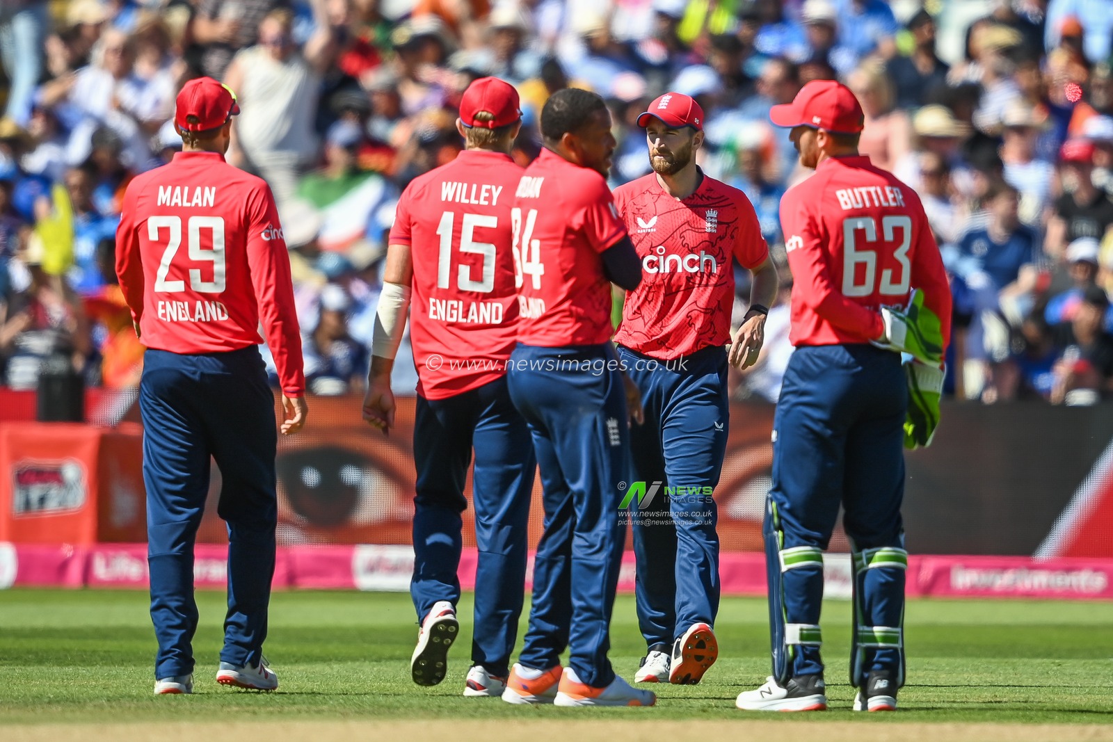 England celebrate the wicket of Harshal Patel of India