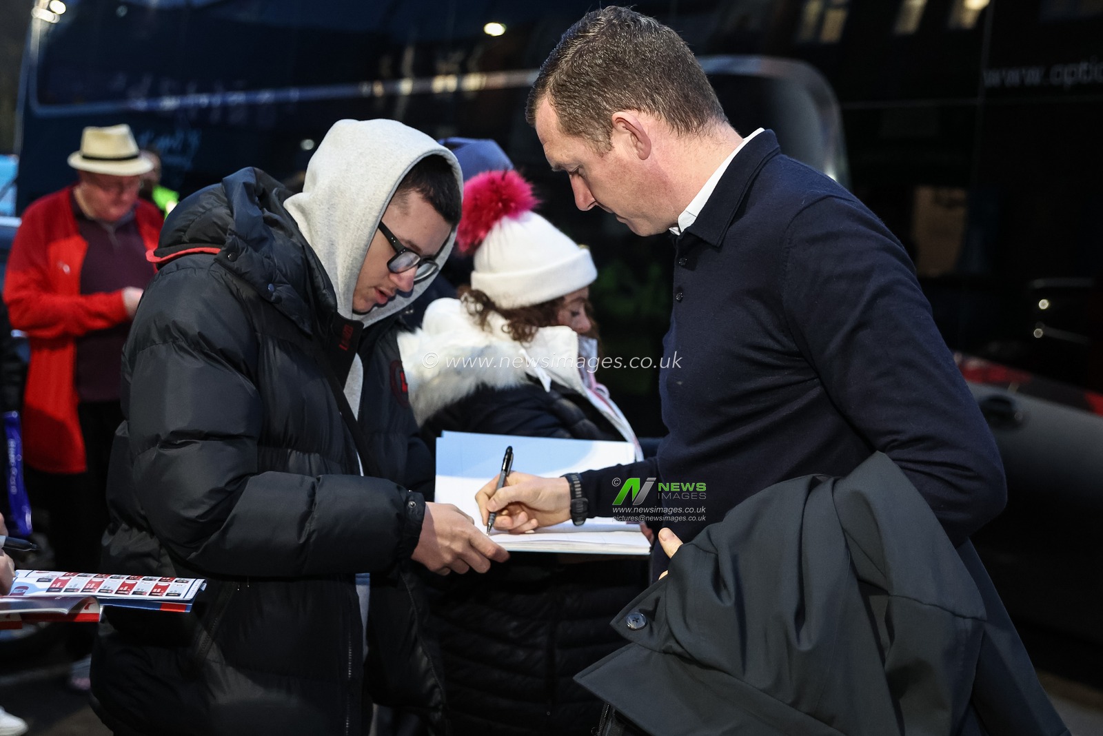 Neill Collins Head coach of Barnsley sings books during the Sky Bet League 1 match Carlisle United vs Barnsley at Brunton Park, Carlisle, United Kingdom, 12th March 2024

(Photo by Mark Cosgrove/News Images)