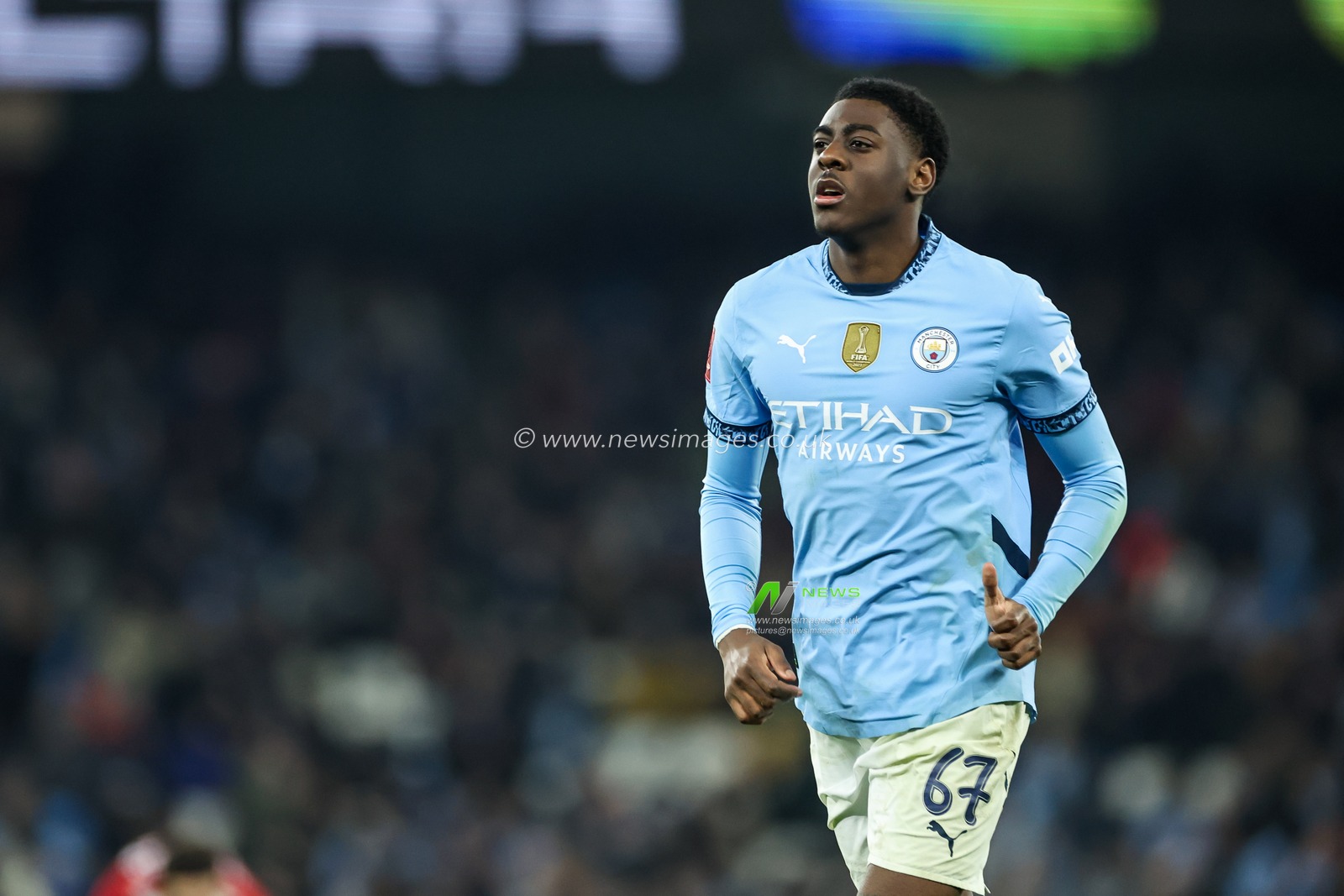 Divin Mubama of Manchester City during the Emirates FA Cup 3rd Round match Manchester City vs Salford City at Etihad Stadium, Manchester, United Kingdom, 11th January 2025

(Photo by Mark Cosgrove/News Images)