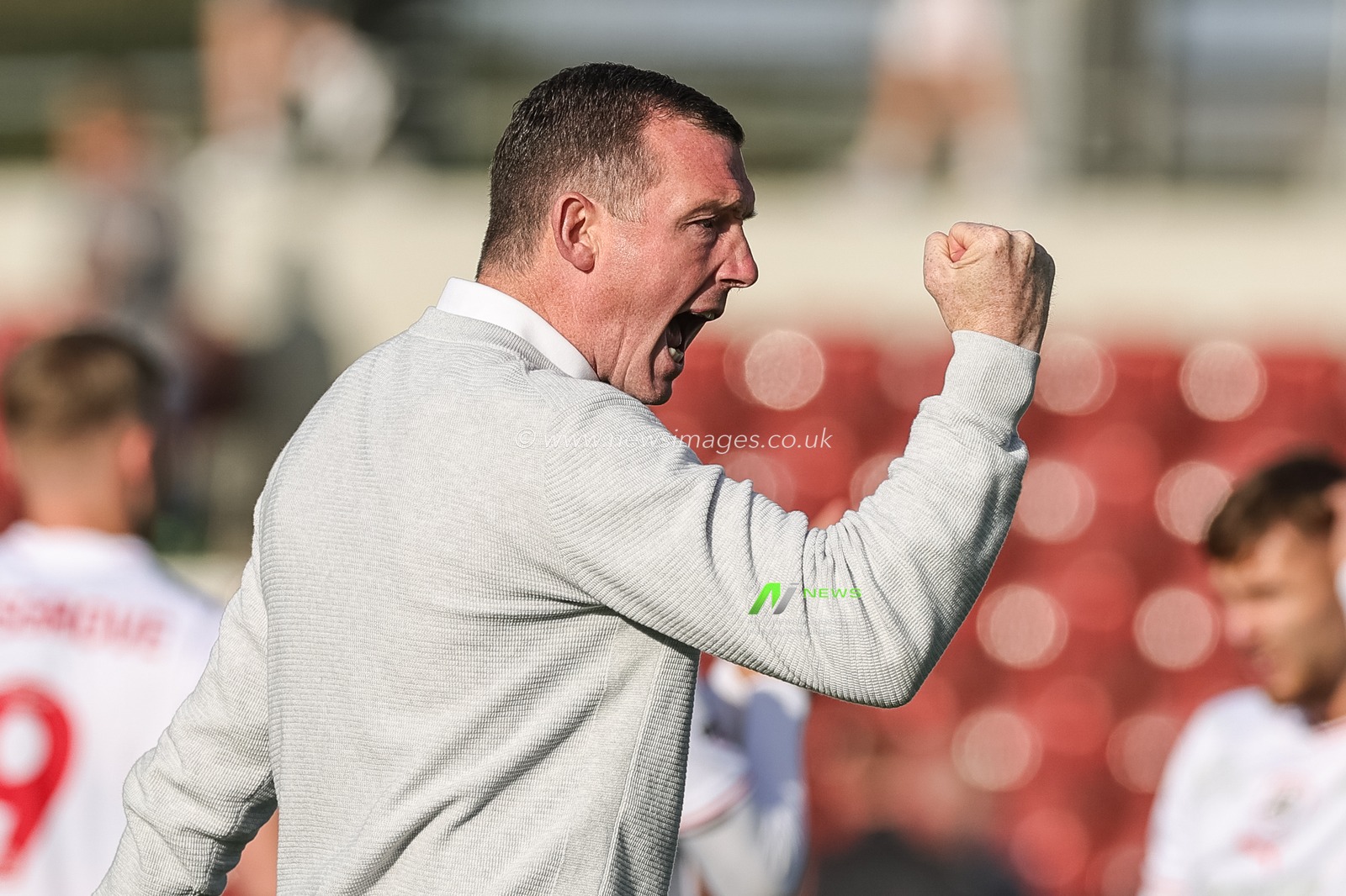 Neill Collins Head coach of Barnsley punches the air as he celebrates the 1-2 win with the fans during the Sky Bet League 1 match Northampton Town vs Barnsley at Sixfields Stadium, Northampton, United Kingdom, 23rd September 2023

(Photo by Mark Cosgrove/News Images)