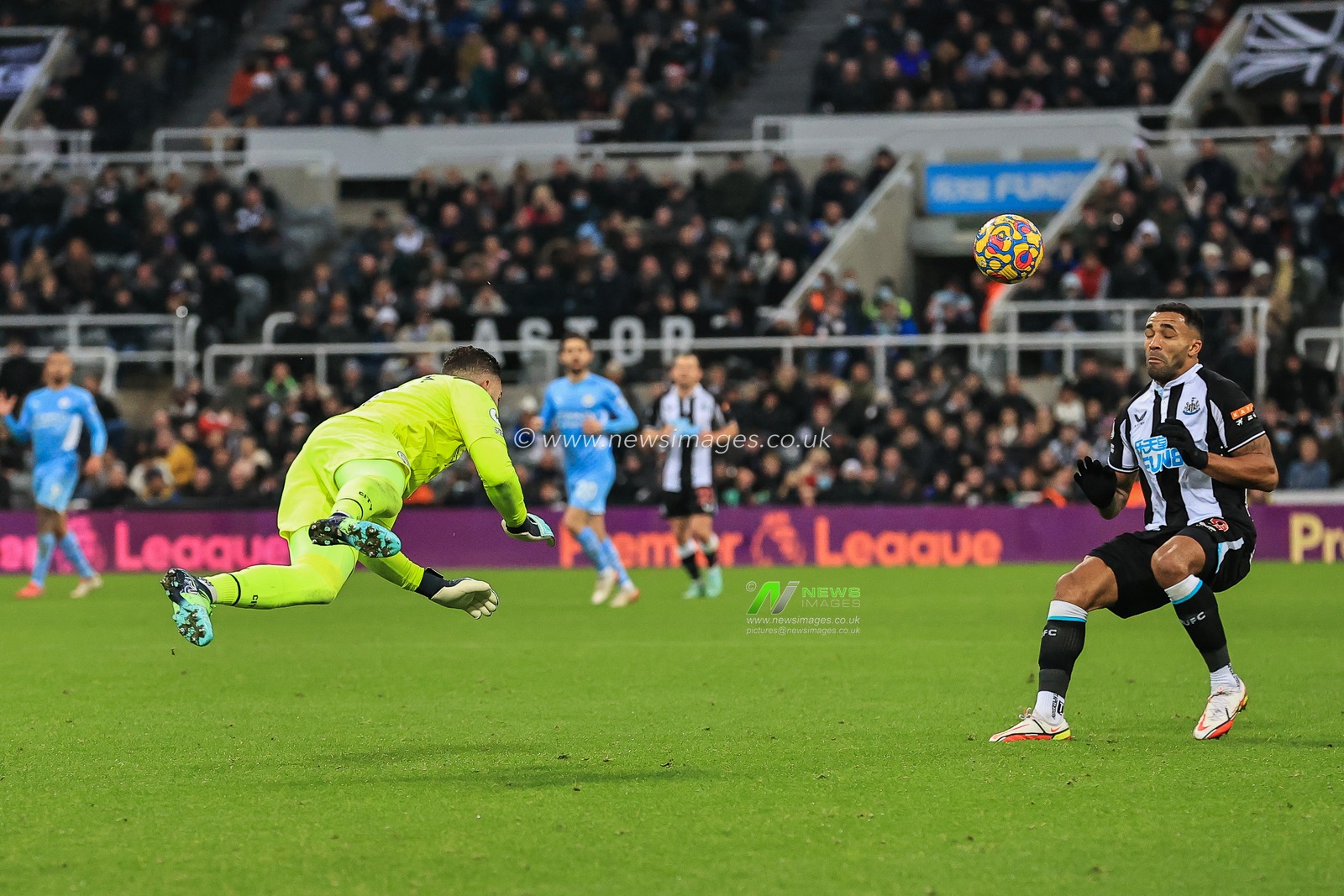 Ederson #31 of Manchester City heads the ball clear outside of the penalty area