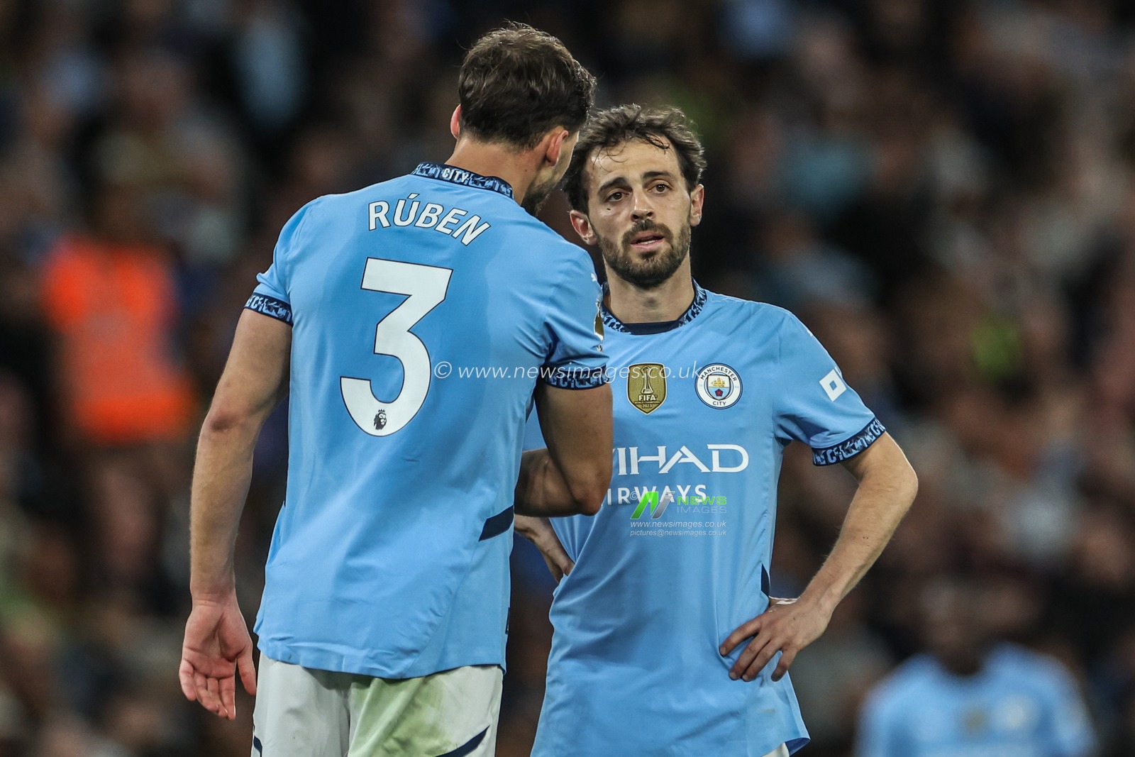 RÃºben Dias of Manchester City speaks to Bernardo Silva of Manchester City during the Premier League match Manchester City vs Wolverhampton Wanderers at Etihad Stadium, Manchester, United Kingdom, 2nd May 2025

(Photo by Mark Cosgrove/News Images)