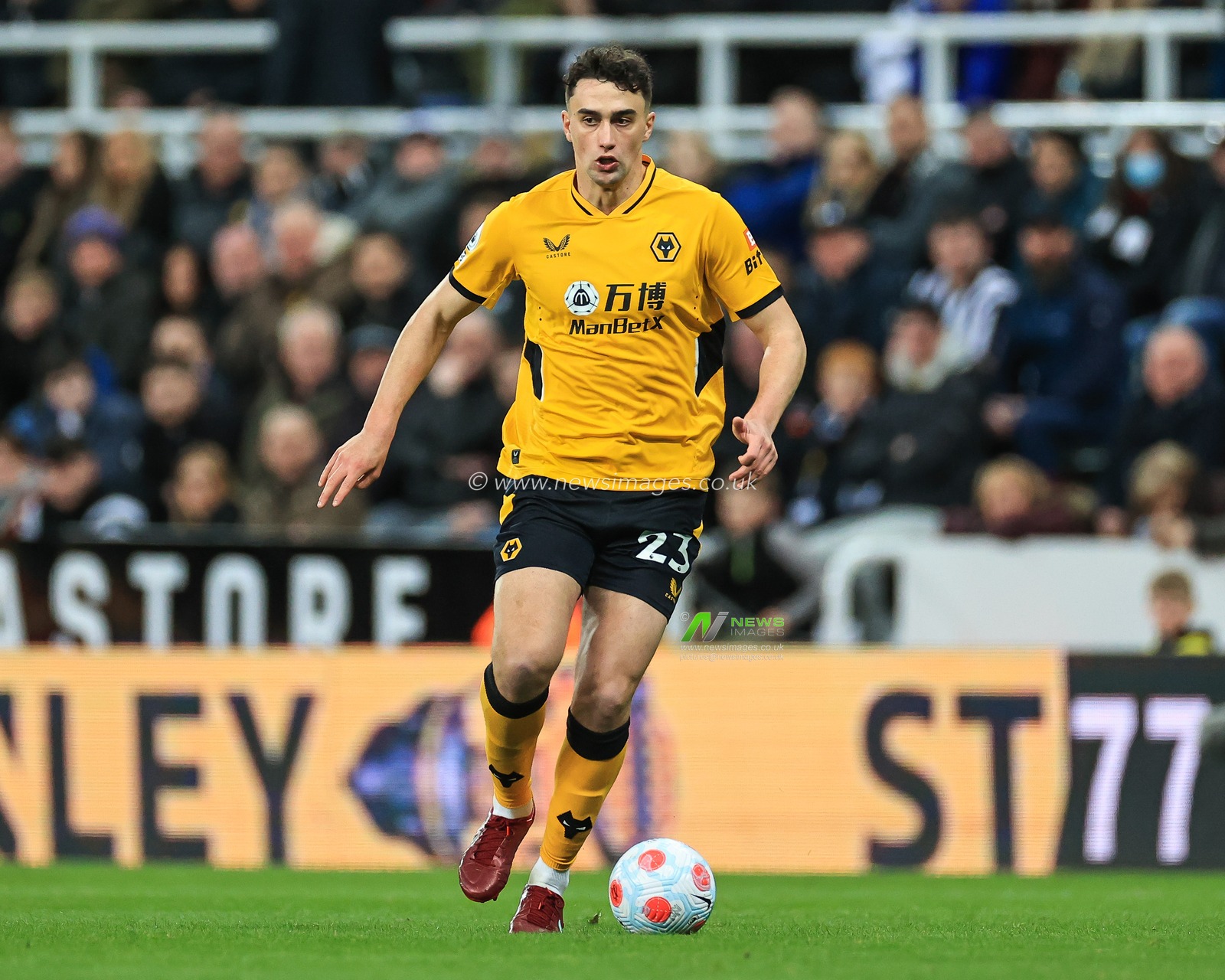 Max Kilman #23 of Wolverhampton Wanderers makes a break with the ball