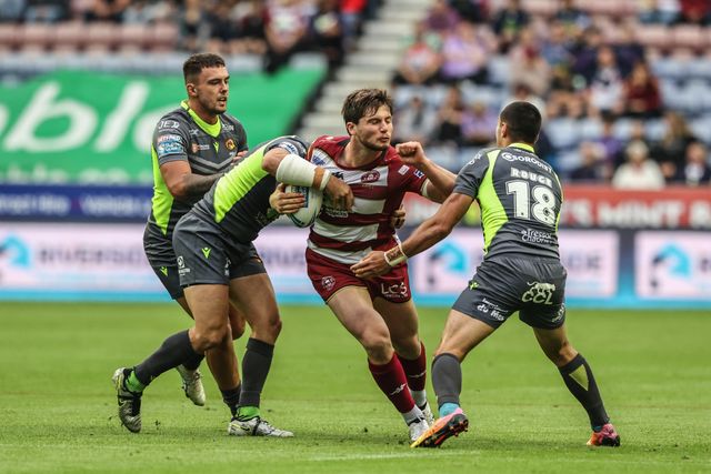 Ethan Havard of Wigan Warriors is tackled by Benjamin Garcia of Catalan Dragons during the Betfred Super League round 20 match Wigan Warriors vs Catalans Dragons at The Brick Community Stadium, Wigan, United Kingdom, 25th July 2025

(Photo by Alfie Cosgrove/News Images)