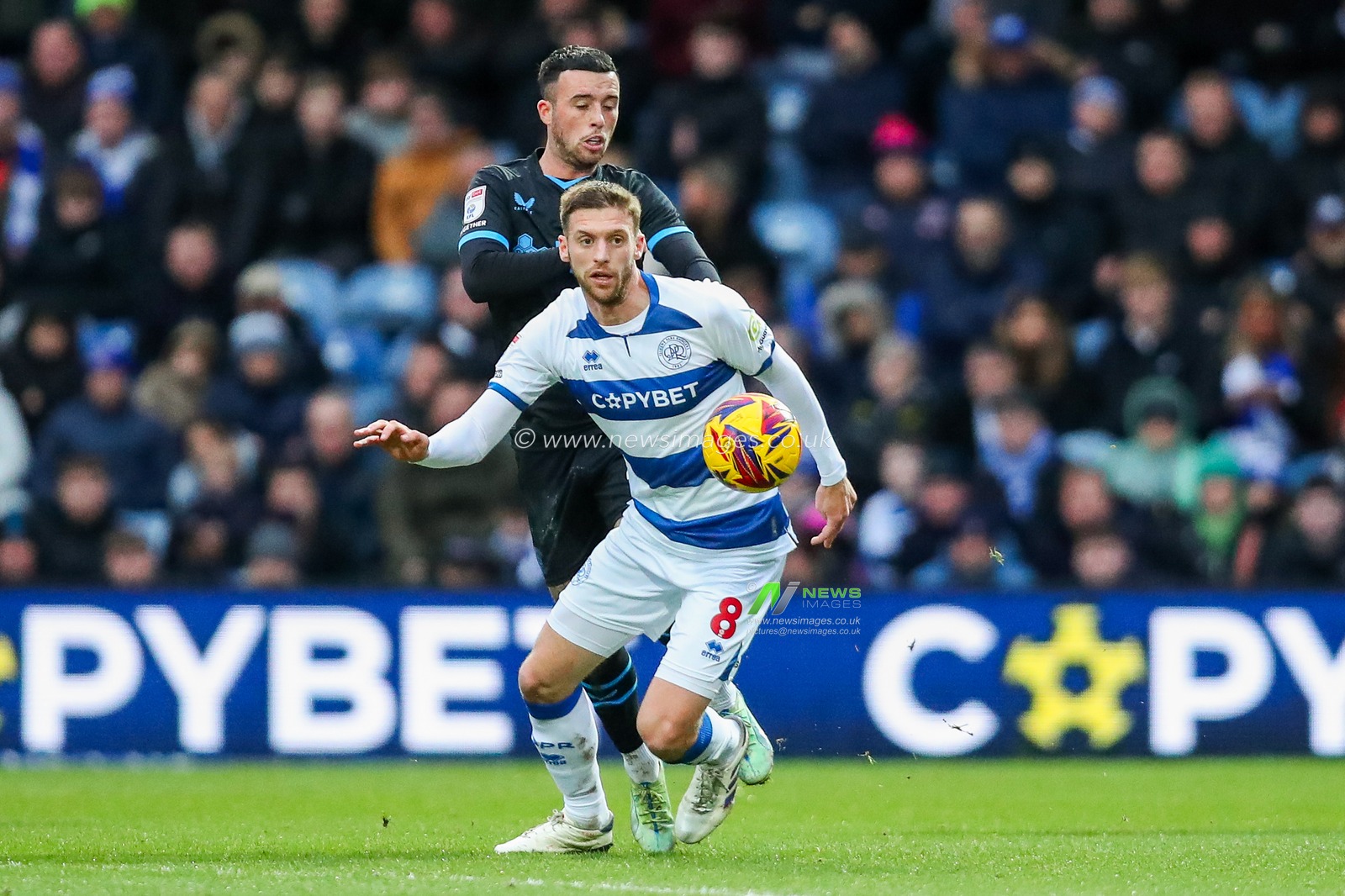 Sam Field of Queens Park Rangers is put under pressure by Sam Greenwood of Preston North End during the Sky Bet Championship match Queens Park Rangers vs Preston North End at Matrade Loftus Road, London, United Kingdom, 21st December 2024

(Photo by Izzy Poles/News Images)
