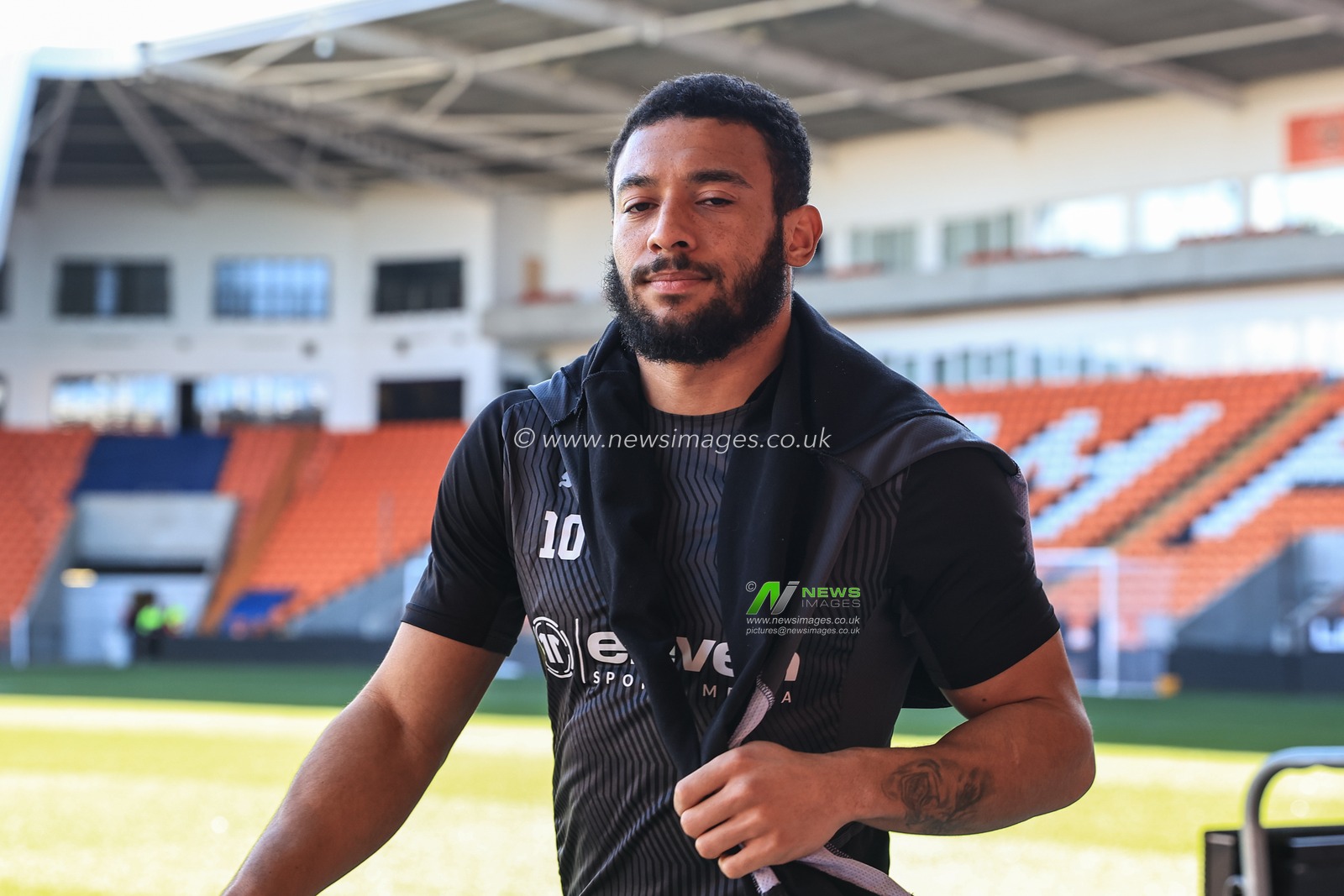 Keshi Anderson #10 of Blackpool arrives at Bloomfield Road