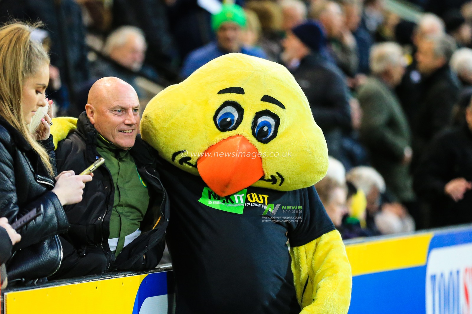 10th April 2019, Carrow Road, Norwich, England; Sky Bet Championship, Norwich City vs Reading ;  Norwich's mascot greets a fan

Credit: Georgie Kerr/News Images

English Football League images are subject to DataCo Licence