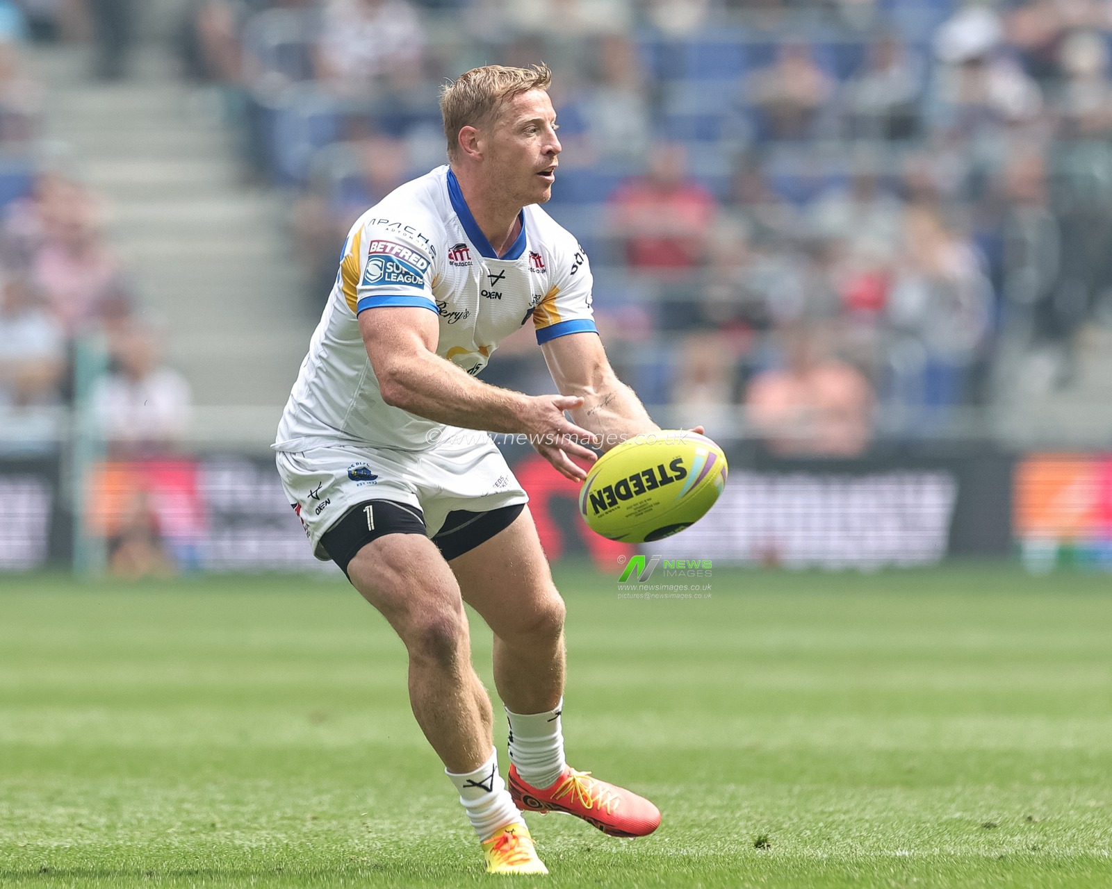 Lachie Miller of Leeds Chinos offloads during the Betfred Super League Magic Weekend match Leeds Rhinos vs Bradford Bulls at Hill Dickinson Stadium, Liverpool, United Kingdom on 05 July 2026

(Photo by Mark Cosgrove/News Images)