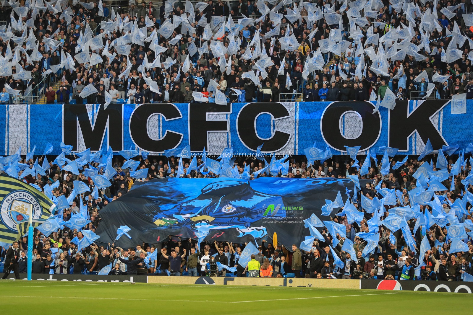 17th April 2019 , Etihad Stadium, Manchester, England; UEFA Champions League, Quarter Final, Second Leg, Manchester City v Tottenham ; Manchester City drape flags from the stadium 


Credit: Mark Cosgrove/News Images