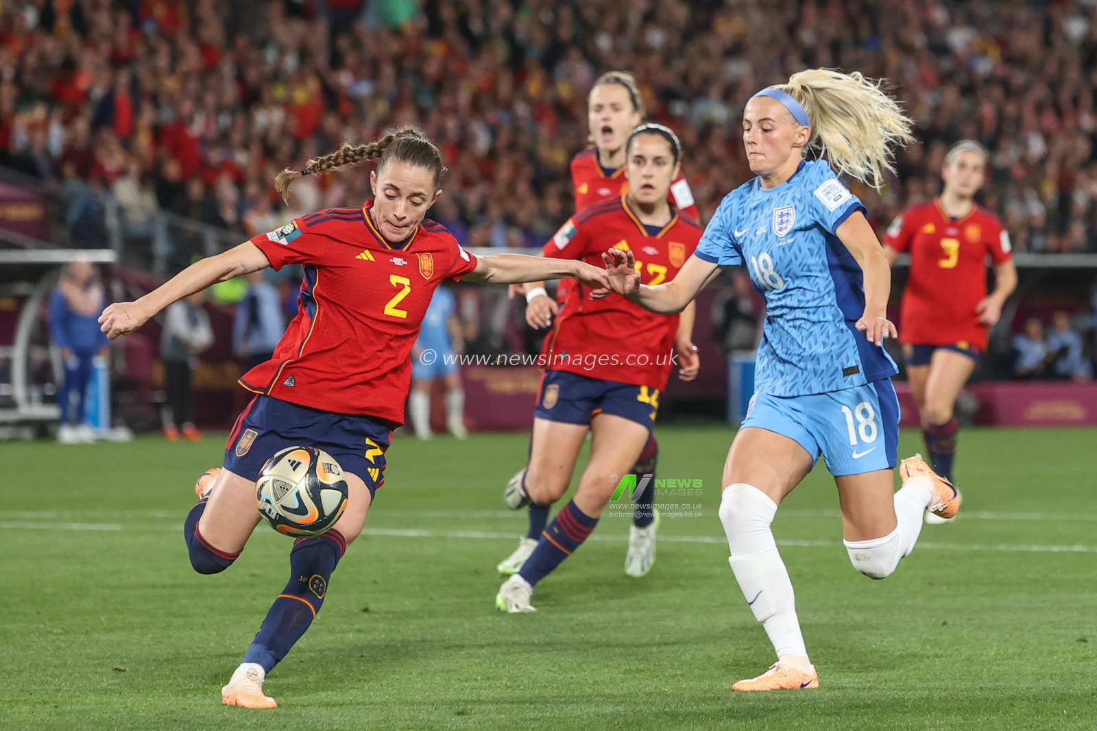 Ona Batlle #2 of Spain clears the ball as Chloe Kelly #18 of England pressures during the FIFA Women's World Cup 2023 Final match Spain Women vs England Women at Stadium Australia, Sydney, Australia, 20th August 2023

(Photo by Patrick Hoelscher/News Images)