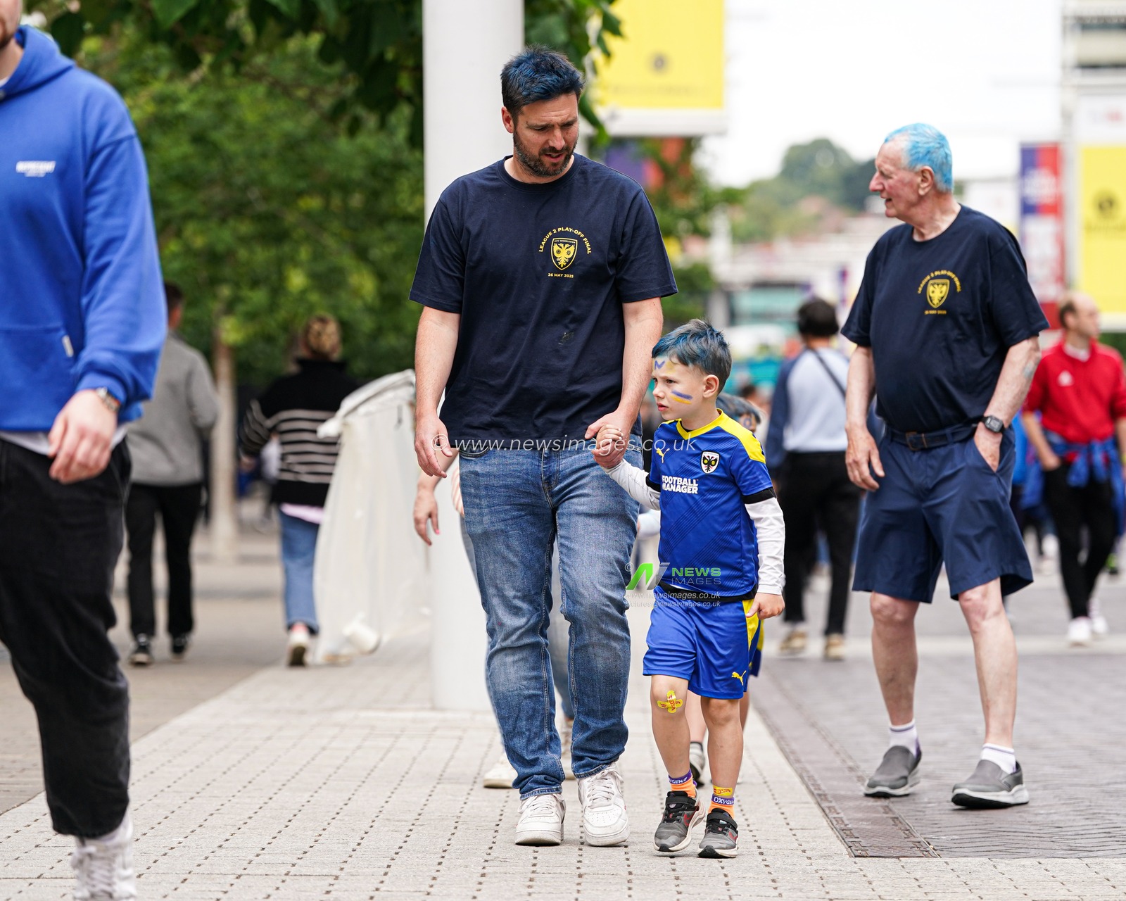 Wimbledon fans walking down Wembley way ahead of the Sky Bet League 2 Playoff Final match AFC Wimbledon vs Walsall at Wembley Stadium, London, United Kingdom, 26th May 2025

(Photo by Harvey Murphy/News Images)